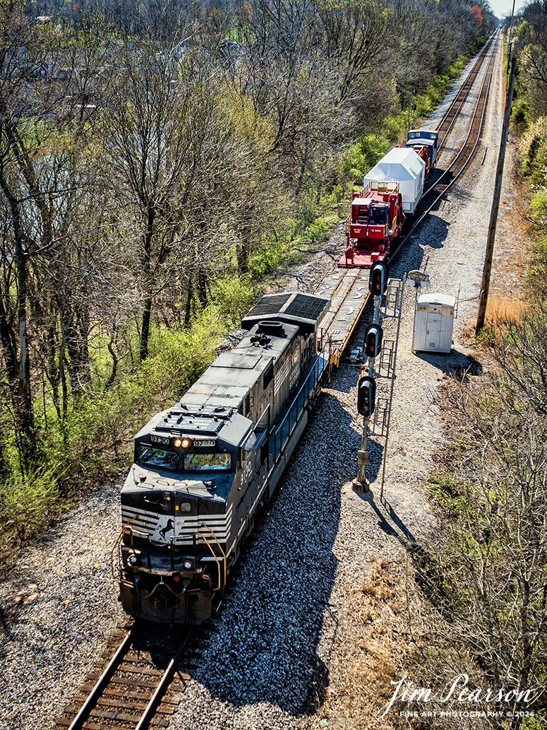 Norfolk Southern 3730 leads CSX S991 with an oversized Turbine load from Siemens Energy on a depressed flatbed northbound from the north end of Harwood at Evansville, Indiana, on the CSX Evansville Terminal Subdivision, on March 20th, 2024. 

B229 originated at Birmingham, AL and is headed for New Castle, PA. I caught this move just north of Evansville, IN and gave chase to Patoka, Indiana. 

Tech Info: DJI Mavic 3 Classic Drone, RAW, 22mm, f/2.8, 1/1250, ISO 130.

#trainphotography #railroadphotography #trains #railways #jimpearsonphotography #trainphotographer #railroadphotographer #csxt #dronephoto #trainsfromadrone #trending #csxcedsubdivision #norfolksouthern #trending