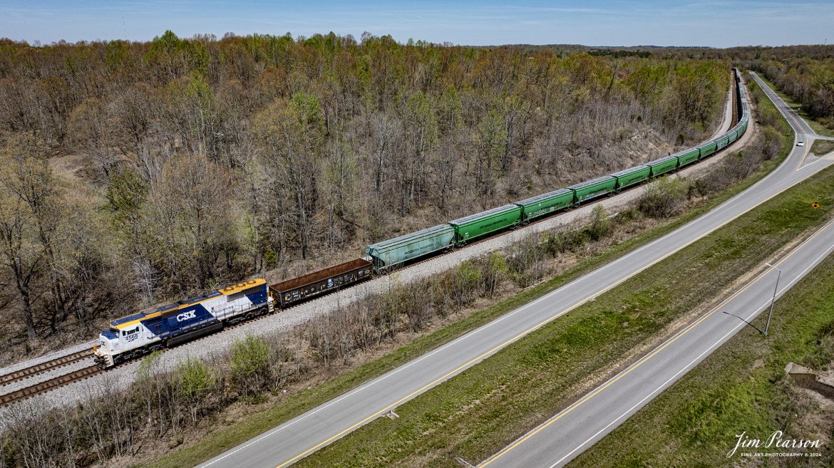 CSX X513, with the CSX Operation Lifesaver locomotive CSXT 4568 leading, heads south on the Henderson Subdivision on April 12th, 2023, at Romney, Nortonville, Ky.

According to a CSX press release: CSX unveiled a new OLI rail safety commemorative locomotive in September of 2022, and it was painted at the railroads locomotive shop in Huntington, West Virginia. The CSXT 4568 engine will travel the company’s rail network as a visual reminder for the public to be safe at highway-rail grade crossings and near railroad tracks.

Tech Info: DJI Mavic 3 Classic Drone, RAW, 22mm, f/2.8, 1/1600, ISO 100.

#trainphotography #railroadphotography #trains #railways #jimpearsonphotography #trainphotographer #railroadphotographer #dronephoto #trainsfromadrone #CSX #trending