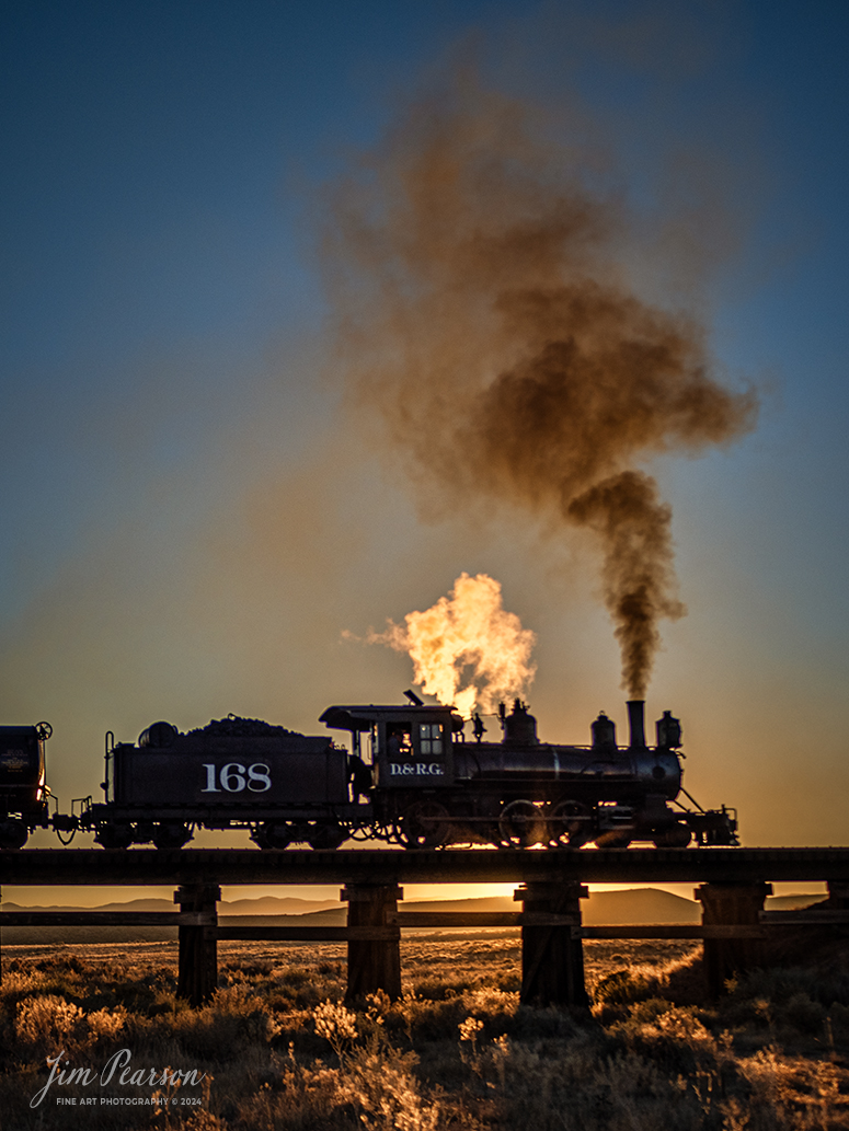 Cumbres & Toltec Scenic Railroad steam locomotive D&RGW 168 passes over Ferguson's Trestle at MP 285.87 at sunrise as it heads to Osier, Colorado, during a photo charter by Dak Dillon Photography on October 20th, 2023.

According to their website: the Cumbres & Toltec Scenic Railroad is a National Historic Landmark.  At 64-miles in length, it is the longest, the highest and most authentic steam railroad in North America, traveling through some of the most spectacular scenery in the Rocky Mountain West.

Owned by the states of Colorado and New Mexico, the train crosses state borders 11 times, zigzagging along canyon walls, burrowing through two tunnels, and steaming over 137-foot Cascade Trestle. All trains steam along through deep forests of aspens and evergreens, across high plains filled with wildflowers, and through a rocky gorge of remarkable geologic formations. Deer, antelope, elk, fox, eagles and even bear are frequently spotted on this family friendly, off-the grid adventure.

Tech Info: Nikon D810, RAW, Sigma 24-70 @ 24mm, f/3.2, 1/1600, ISO 90.

#railroad #railroads #train #trains #bestphoto #railroadengines #picturesoftrains #picturesofrailway #bestphotograph #photographyoftrains #trainphotography #JimPearsonPhotography #DurangoandSilvertonRailroad #trending