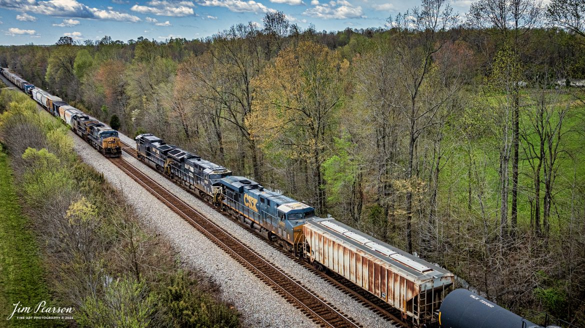 A loaded southbound ethanol train, CSX B621 with Norfolk Southern 4025, 3603 and CSXT 5481 on main 1 meets Casky Yard local L391 headed north, on April 12th, 2024, at Nortonville, Kentucky, on the CSX Henderson Subdivision.

The Henderson Subdivision sees foreign power quite often and this train is one example of it. This train runs from Bensenville, IL (CPKC) to Hookers Point - Tampa, FL, as needed.

Tech Info: DJI Mavic 3 Classic Drone, RAW, 22mm, f/2.8, 1/1000, ISO 380.