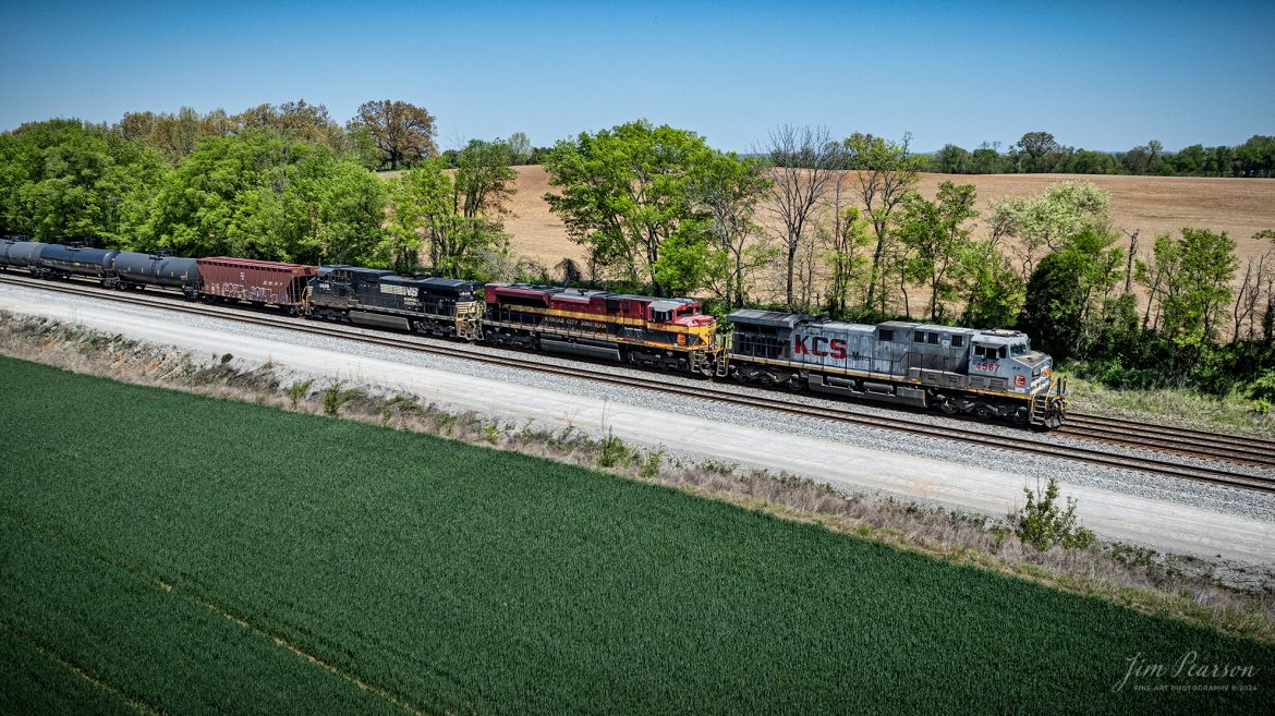 A loaded southbound ethanol train, CSX B647 with Kansas City Southern Gray Ghost 4567, KCS 4162 and Norfolk Southern 9649 leading, heads south as it approaches the middle of Casky Yard at Hopkinsville, Kentucky on April 15th, 2024, on the CSX Henderson Subdivision.

The Henderson Subdivision sees foreign power quite often and this train is one example of it. This train runs from Bensenville, IL (CPKC) to Lawrenceville, GA, as needed.

Tech Info: DJI Mavic 3 Classic Drone, RAW, 22mm, f/2.8, 1/1600, ISO 100.