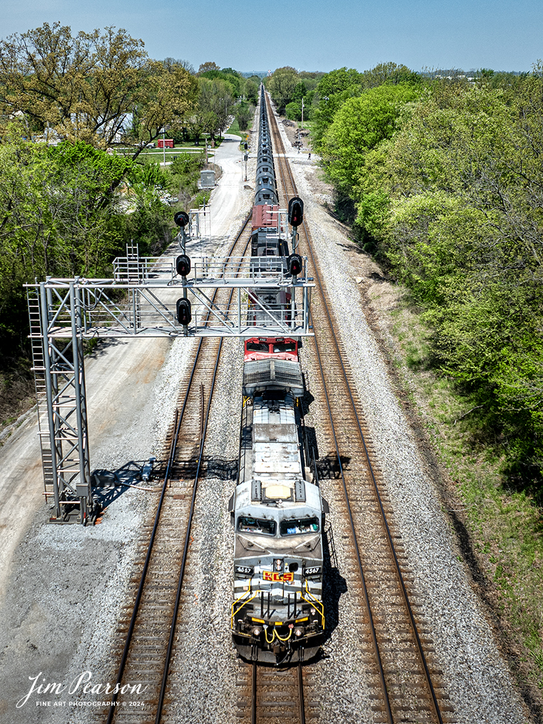 A loaded southbound ethanol train, CSX B647 with Kansas City Southern Gray Ghost 4567, KCS 4162 and Norfolk Southern 9649 leading, heads south as it approaches Casky Yard at Hopkinsville, Kentucky on April 15th, 2024, on the CSX Henderson Subdivision.

The Henderson Subdivision sees foreign power quite often and this train is one example of it. This train runs from Bensenville, IL (CPKC) to Lawrenceville, GA, as needed.

Tech Info: DJI Mavic 3 Classic Drone, RAW, 22mm, f/2.8, 1/1600, ISO 100.