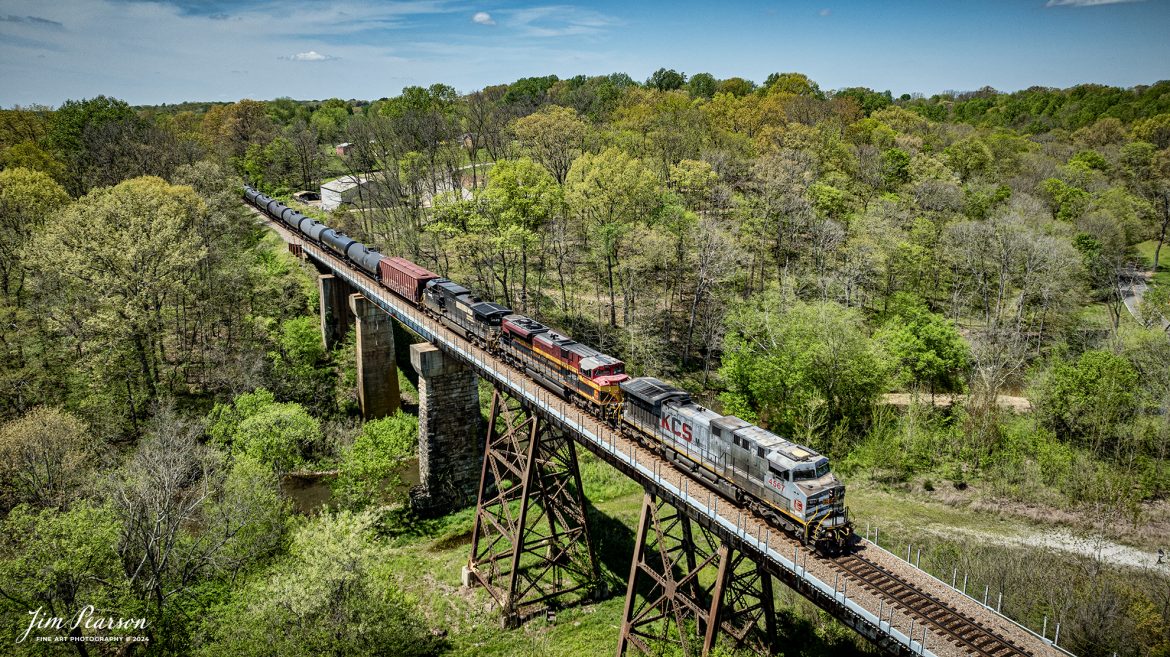A loaded southbound ethanol train, CSX B647 with Kansas City Southern Gray Ghost 4567, KCS 4162 and Norfolk Southern 9649 leading, heads south across the Sulfur Fork Creek Trestle at Springfield, Tennessee, on April 15th, 2024, on the CSX Henderson Subdivision.

The Henderson Subdivision sees foreign power quite often and this train is one example of it. This train runs from Bensenville, IL (CPKC) to Lawrenceville, GA, as needed.

Tech Info: DJI Mavic 3 Classic Drone, RAW, 22mm, f/2.8, 1/1600, ISO 100.
