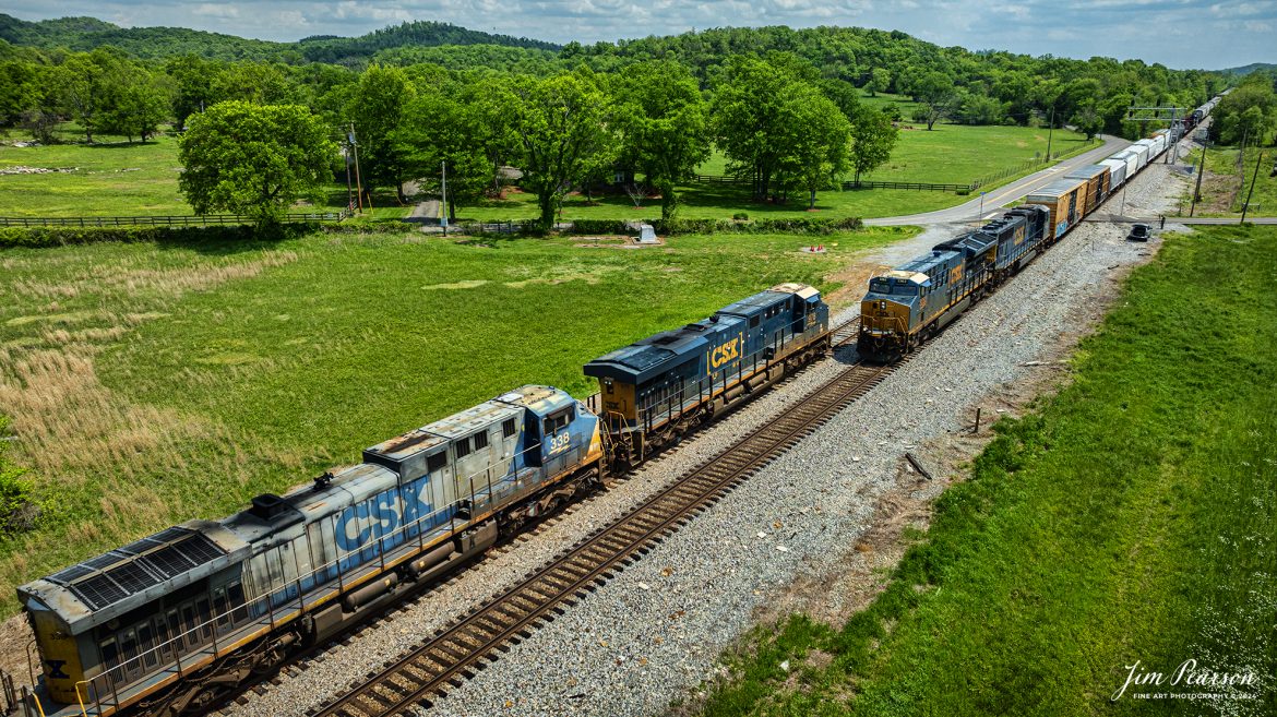 CSX M582 and C904 meet at Fosterville, TN on the Chattanooga Subdivision, on April 26th, 2024.

According to Wikipedia: The Chattanooga Subdivision is a railroad line owned by CSX Transportation in the U.S. states of Tennessee, Alabama & Georgia. The line runs from Nashville, Tennessee, to Chattanooga, Tennessee, for a total of 140.0 miles (225.3 km). At its north end the line continues south from the Nashville Terminal Subdivision and at its south end the line continues south as the W&A Subdivision.

Tech Info: DJI Mavic 3 Classic Drone, RAW, 22mm, f/2.8, 1/1600, ISO 100.

#railroad #railroads #train #trains #bestphoto #railroadengines #picturesoftrains #picturesofrailway #bestphotograph #photographyoftrains #trainphotography #JimPearsonPhotography