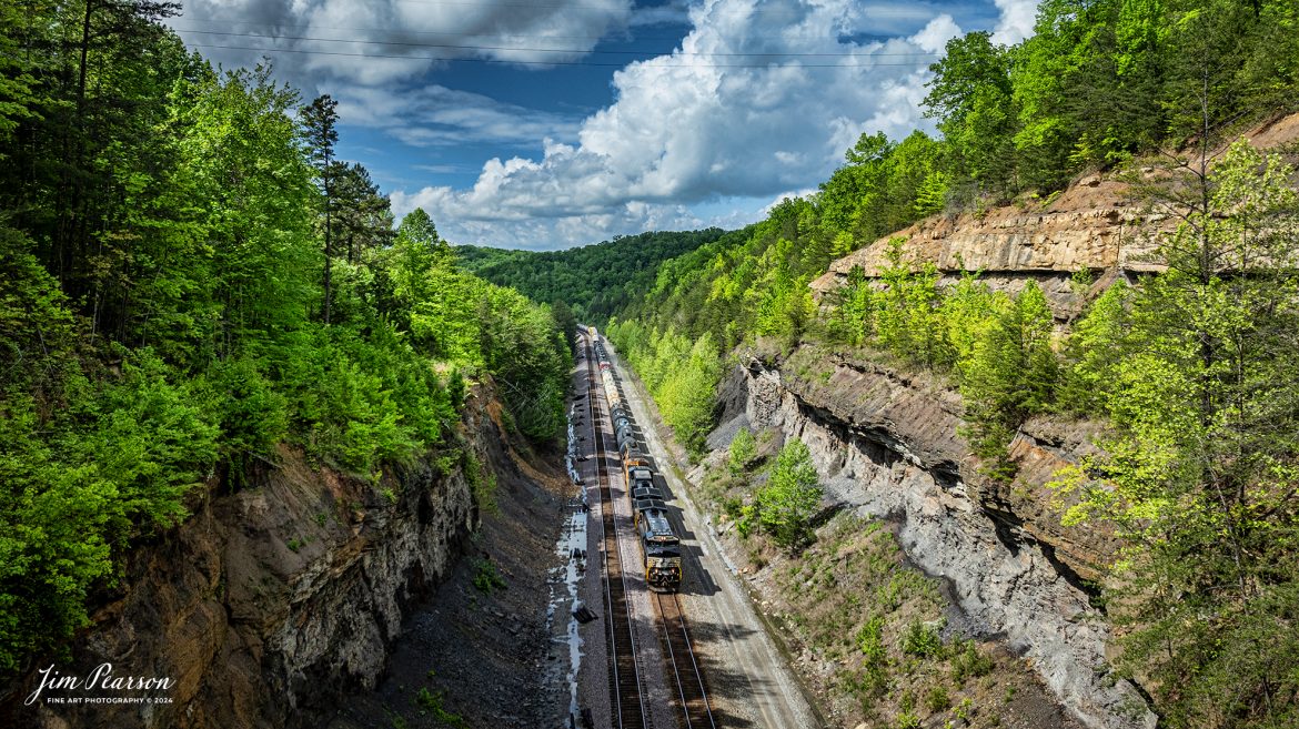 Norfolk Southern 143 (Elkhart, IN, DeButts Yard - Chattanooga, TN) heads south at Keno cut on the NS CNO&TP (Rathole) Second District south of Tateville, Kentucky, on April 29th, 2024. This was my first time shooting from this location and really love it! A big shout out to Andrew Stephenson and Matt Murphy for help during my trip along the Second District!! Because of you it was a very successful trip!
I didn’t make it all the way to Danville, Ky like I had planned as the time caught up with me, so I guess that means another trip down the road!! Stay tuned as I have a lot of photos and videos, I’m working on to share with everyone!

Tech Info: DJI Mavic 3 Classic Drone, RAW, 24mm, f/2.8, 1/2000, ISO 160.

#trainphotography #railroadphotography #trains #railways #dronephotography #trainphotographer #railroadphotographer #jimpearsonphotography #trains #bnsf #mavic3classic #drones #trainsfromtheair #trainsfromadrone #KinoCut #NorfolkSouthern #TennesseeTrains