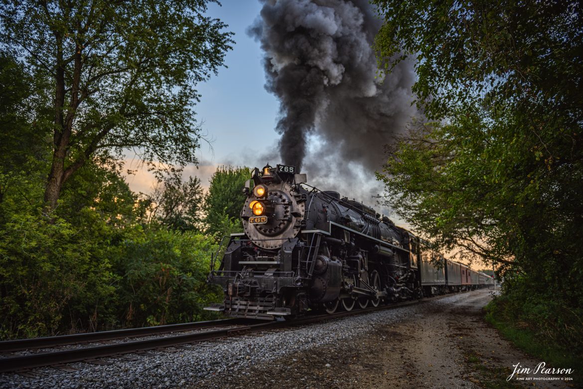 August 30th, 2024, Steam locomotive Nickel Plate 765 leads “The Limited” as it departs Pleasant lake, Indiana on a late evening passenger train run to Reading, Michigan, as part of Indiana Rail Experience’s Rolling Victory Weekend.

According to their website: Rolling Victory was a three-day living history event celebrating American military, railroad, and home front history featuring vintage train rides, World War II reenactors, battles, a big band orchestra, and an immersive and educational experience for all ages in Pleasant Lake, Indiana.

Tech Info: Nikon D810, RAW, Nikon 24-70 @ 24mm, f/2.8, 1/250, ISO 64.

#railroad #railroads #train, #trains #railway #railway #steamtrains #railtransport #railroadengines #picturesoftrains #picturesofrailways #besttrainphotograph #bestphoto #photographyoftrains #bestsoldpicture #JimPearsonPhotography #steamtrains #nkp765 #passengertrains