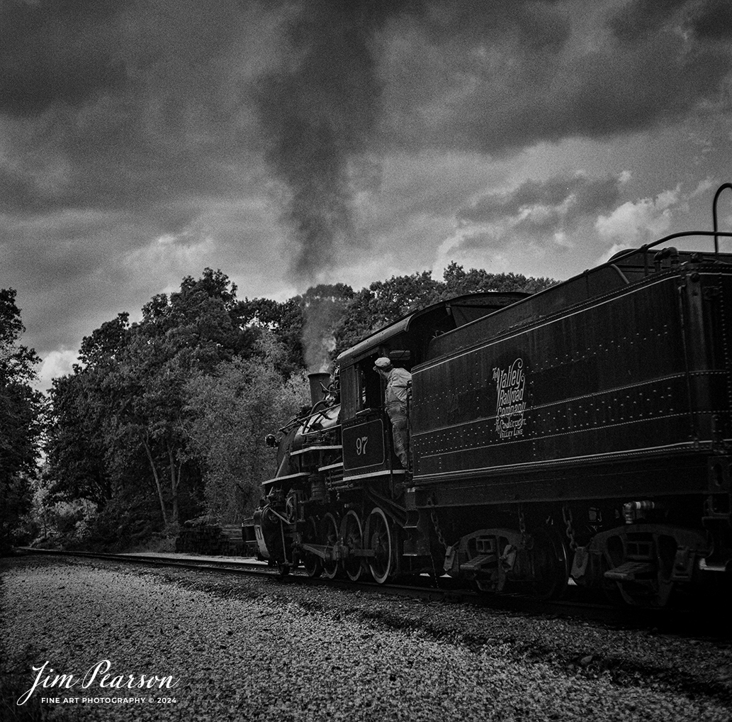 Film Wednesday – October 9th, 2024, The Valley Railroad Company steam engine #97 heads out of Essex, Connecticut as the fireman keeps a watchful eye on the track ahead, during a Dak Dillon Photography photo charter.

According to Wikipedia: The Valley Railroad, operating under the name Essex Steam Train and Riverboat, is a heritage railroad based in Connecticut on tracks of the Connecticut Valley Railroad, which was founded in 1868. The company began operations in 1971 between Deep River and Essex and has since reopened additional parts of the former Connecticut Valley Railroad line. It operates the Essex Steam Train and the Essex Clipper Dinner Train.

Valley Railroad No. 97 is a preserved 2-8-0 steam locomotive that was built in 1923 by the American Locomotive Company's Cooke Works.

Tech Info: Mamiya C330 Professional, Ilford HP5 Film, Mamiya 80mm, f/5.6, 1/400, ISO 400.

#JimPearsonPhotography #filmphotography #blackandwhite #filmphotography