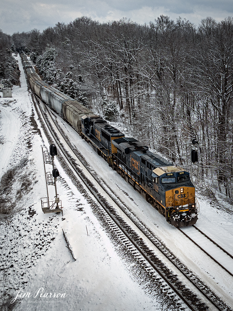 CSX M503 takes the siding at the north end of the siding at Kelly, Kentucky after a snow fall on January 11th, 2024, as they make their way south on the CSX Henderson Subdivision.

Tech Info: DJI Mavic 3 Classic Drone, RAW, 24mm, f/2.8, 1/2000, ISO 100.

#bestphoto #trains #bestsoldpicture #JimPearsonPhotography #trainsfromtheair #trainsfromadrone