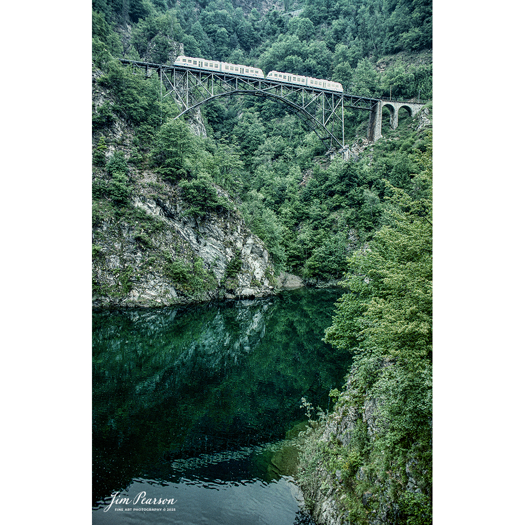 Film Wednesday – 1993 – Today’s slide scans are from a trip I took between Aviano, Italy and Zermatt, Switzerland. This image is from the section of the trip where I was on the Glacier Express that took me into Zermatt. I haven’t a clue exactly to the location where this commuter trainset was crossing over one of the many bridges that dot the landscape in this area. If anyone recognizes this location, let me know in the comments.

Tech Info: Camera, Nikon F3, Kodachrome Slide Film, no other data recorded, Scanned with a PlusTek 82001i Film Scanner.

#slidescan #filmphotography #trains #railroads #jimpearsonphotography #FilmPhotography