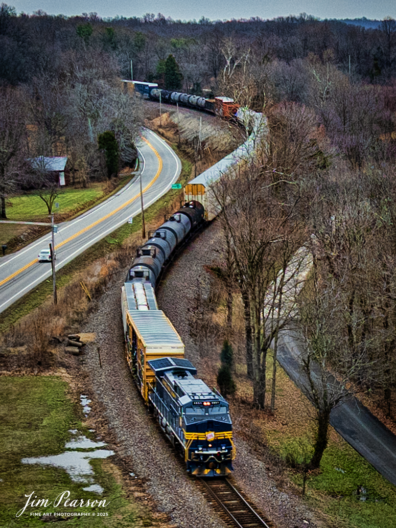 I spent New Year’s Day this year with fellow railfan Ryan Scott and we spent it chasing Norfolk Southern’s newest Heritage Unit, Tennessee, Alabama & Georgia Railway locomotive 4851 as it ran as the DPU on NS 167 On January 1st, 2025.Here the engine brings up the rear as the DPU on NS 167 as it heads east out of Birdseye, Indiana.

Norfolk Southern recently unveiled their newest addition to their Heritage Fleet: the Tennessee, Alabama & Georgia Railway locomotive!

“Once a vital link between Chattanooga and Gadsden, the TAG Railway played a key role in moving coal, steel, and more. Its legacy is now proudly reflected in our fleet.”

Tech Info: DJI Mavic 3 Classic Drone, RAW, 24mm, f/2.8, 1/240, ISO 150.

#railroad #railroads #train, #trains #railway #railway #railtransport #railroadengines #picturesoftrains #picturesofrailways #besttrainphotograph #bestphoto #photographyoftrains #bestsoldpicture #JimPearsonPhotography #trainsfromadrone #nsheritagelocomotives #NSTAGlocomotive