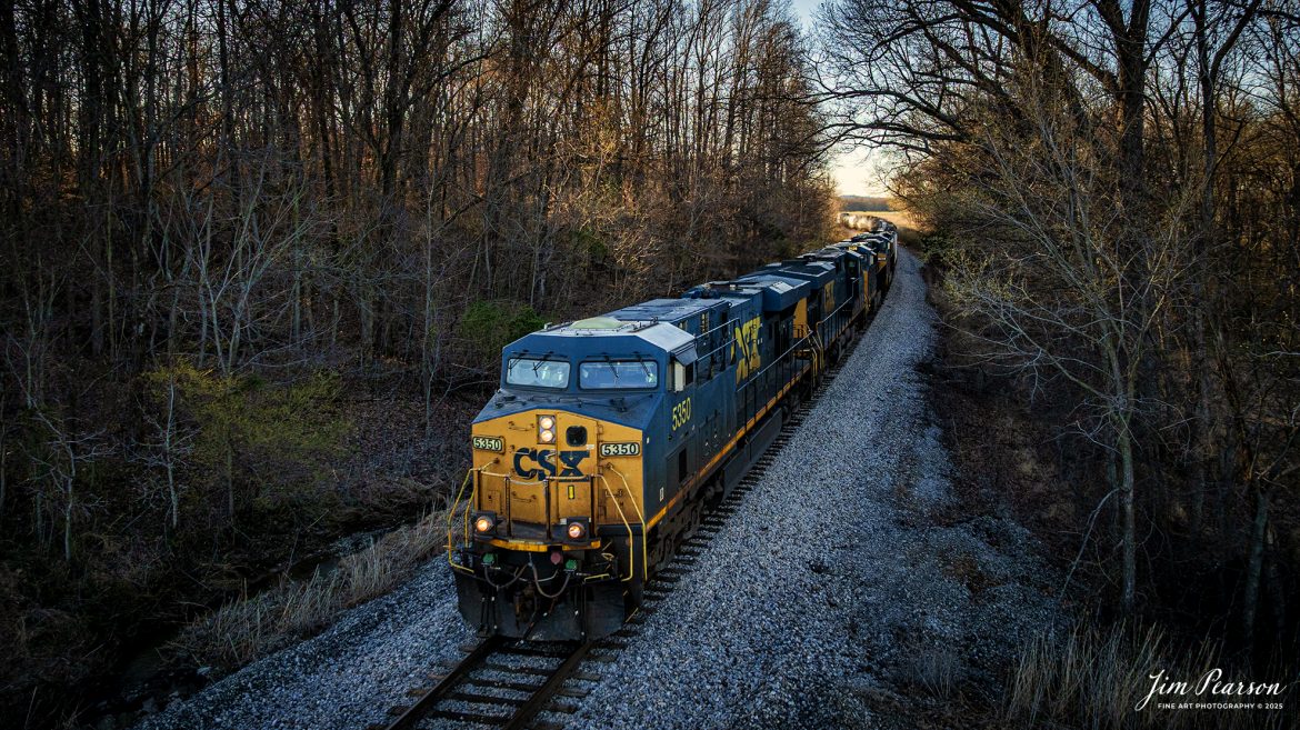 CSXT 5350 leads X503 as they head south through Elmwood Curve, just north of Slaughters, Kentucky, on March 17th, 2025, on the CSX Henderson Subdivision at sunset.

Tech Info: DJI Mavic 3 Classic Drone, RAW, 22mm, f/2.8, 1/800, ISO 380.

#railroad #railroads #train, #trains #railway #railway #railtransport #railroadengines #picturesoftrains #picturesofrailways #besttrainphotograph #bestphoto #photographyoftrains #bestsoldpicture #JimPearsonPhotography #trainsfromadrone #csxhendersonsubdivision #onecsx