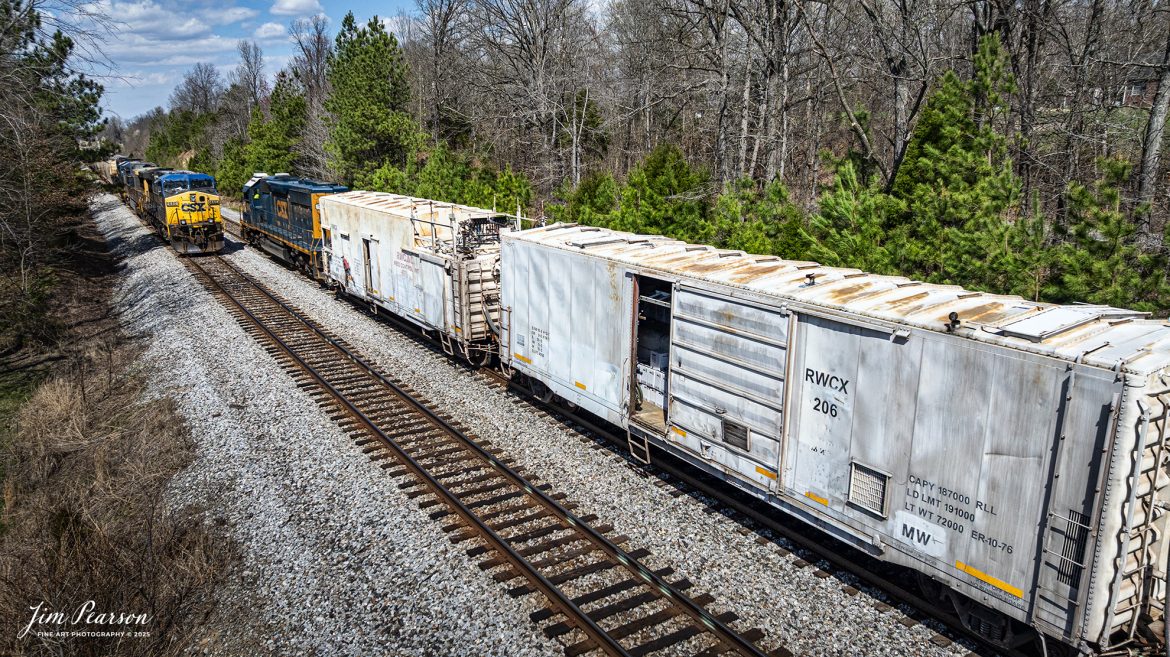 CSXT 8845 heads up CSX W053 as they pull north through the siding with a weed sprayer train at Slaughters, Kentucky as they meet southbound grain train G407, on March 26th, 2025, on the CSX Henderson Subdivision.

Tech Info: DJI Mavic 3 Classic Drone, RAW, 22mm, f/2.8, 1/3200, ISO 110.

#railroad #railroads #train, #trains #railway #railway #railtransport #railroadengines #picturesoftrains #picturesofrailways #besttrainphotograph #bestphoto #photographyoftrains #bestsoldpicture #JimPearsonPhotography #trainsfromadrone #csxhendersonsubdivision #onecsx