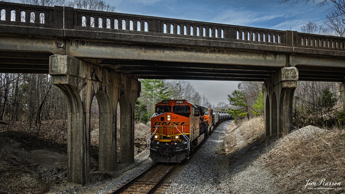 BNSF 3783 leads loaded ethanol train B797 as they pass under the highway 41 overpass at Mannington, Kentucky on March 28th, 2025, on the CSX Henderson Subdivision as it heads south.

Tech Info: DJI Mavic 3 Classic Drone, RAW, 22mm, f/2.8, 1/1622, ISO 200.

#railroad #railroads #train, #trains #railway #railway #railtransport #railroadengines #picturesoftrains #picturesofrailways #besttrainphotograph #bestphoto #photographyoftrains #bestsoldpicture #JimPearsonPhotography #trainsfromadrone #csxhendersonsubdivision #onecsx #bnsf