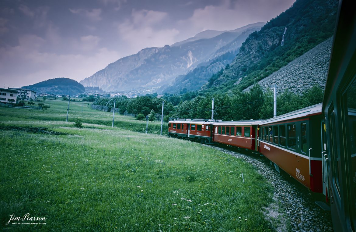 Film Wednesday – 1993 – Today’s slide scans are from a trip I took between Aviano, Italy and Zermatt, Switzerland. This was done from my window on the Glacier Express as we were headed to Zermatt.

I haven’t a clue exactly to the location where this train set was at and again If anyone recognizes this location, let me know in the comments.

According to Wikipedia: The Glacier Express is a direct Panorama Express (PE) train connecting railway stations of the two major mountain resorts of Zermatt and St. Moritz via Andermatt in the central Swiss Alps. The train provides a one-seat ride for an 8-hour end-to-end 291-kilometre (181 mi) journey, and omits stops made by local trains. The Glacier Express has been called the 'slowest express train in the world'. As St. Moritz and Zermatt are home to two well-known mountains, the Glacier Express is also said to travel from Matterhorn to Piz Bernina.

Tech Info: Camera, Nikon F3, Kodachrome Slide Film, no other data recorded, Scanned with a PlusTek 82001i Film Scanner.

#slidescan #filmphotography #trains #railroads #jimpearsonphotography #FilmPhotography