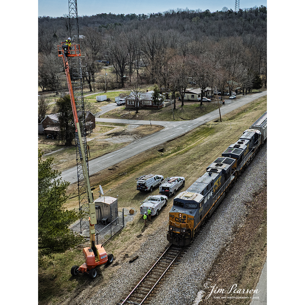 CSX M500 heads north at Mortons Gap, Kentucky as they pass CSX workers working on the communications tower on March 3rd, 2025, on the CSX Henderson Subdivision.

Tech Info: DJI Mavic 3 Classic Drone, RAW, 22mm, f/2.8, 1/2500, ISO 180.

#railroad #railroads #train, #trains #railway #railway #railtransport #railroadengines #picturesoftrains #picturesofrailways #besttrainphotograph #bestphoto #photographyoftrains #bestsoldpicture #JimPearsonPhotography #trainsfromadrone #csxhendersonsubdivision #onecsx