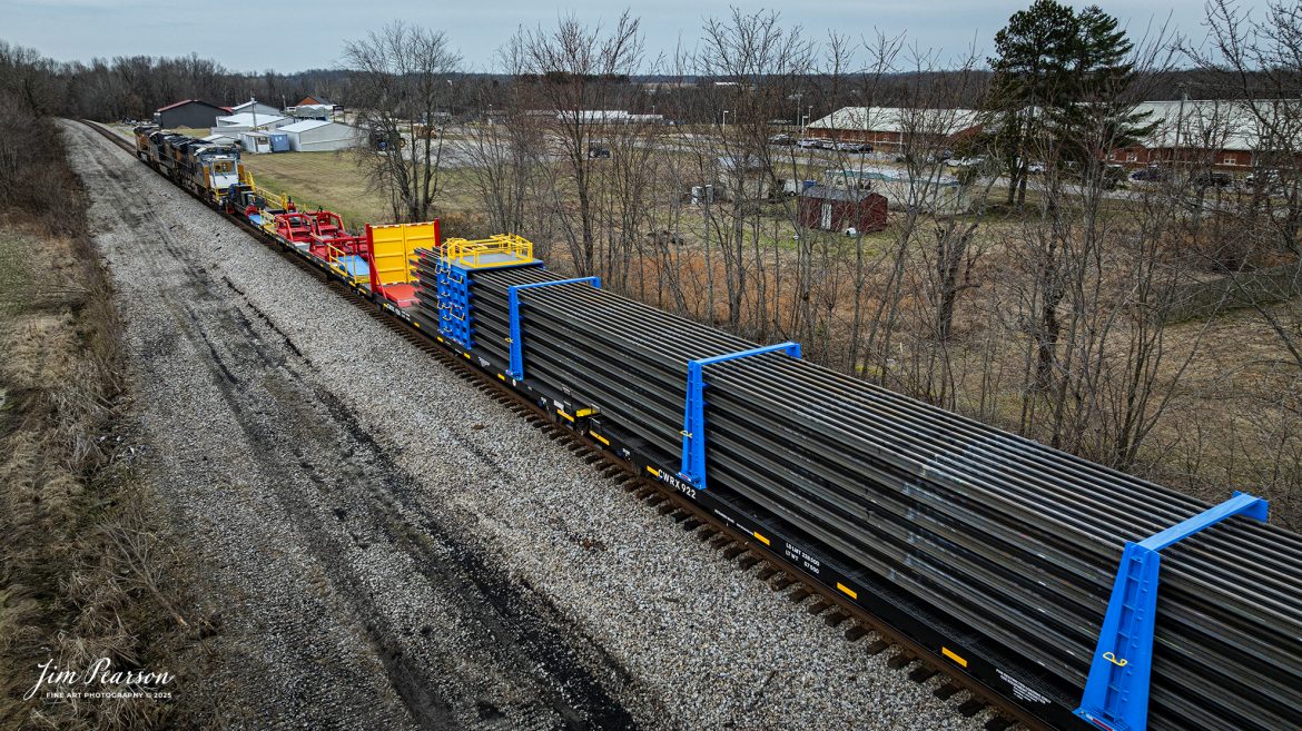 Union Pacific 5890 leads CSX W017, a brand new loaded continuous rail train, as heads south out of Crofton, Kentucky on March 4th, 2025, on the CSX Henderson Subdivision.

Tech Info: DJI Mavic 3 Classic Drone, RAW, 22mm, f/2.8, 1/800, ISO 130.

#railroad #railroads #train, #trains #railway #railway #railtransport #railroadengines #picturesoftrains #picturesofrailways #besttrainphotograph #bestphoto #photographyoftrains #bestsoldpicture #JimPearsonPhotography #trainsfromadrone #trainderailment #csxhendersonsubdivision #onecsx