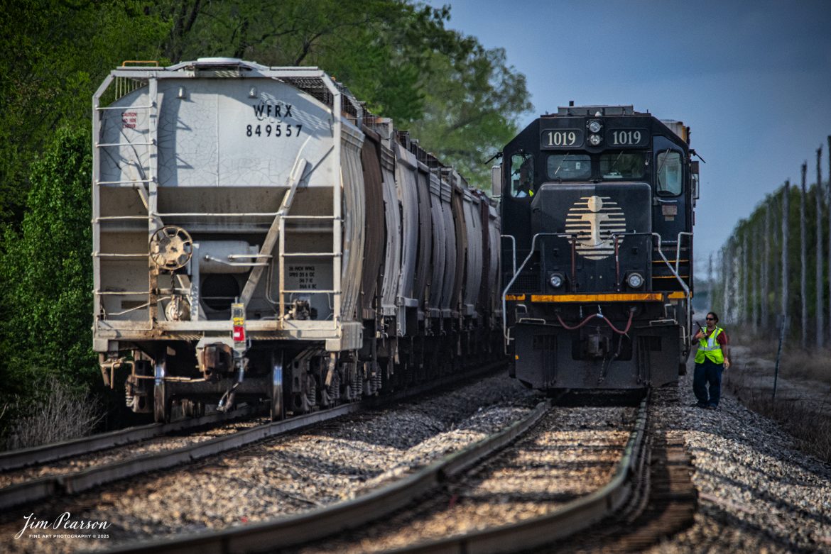 The conductor on Illinois Central 1019 (Death Star) does a roll-by inspection on a northbound Canadian National mixed freight at the south end of the yard lead in Effingham, Illinois on the CN Champagne Subdivision, on April 25th, 2025.

Tech Info: Nikon D810, RAW, Sigma 150-600 @ 150mm, f/5, 1/1600, ISO 1000.

#railroad #railroads #train, #trains #railway #railway #railtransport #railroadengines #picturesoftrains #picturesofrailways #besttrainphotograph #bestphoto #photographyoftrains #bestsoldpicture #JimPearsonPhotography #trainsfromadrone #canadiannational
