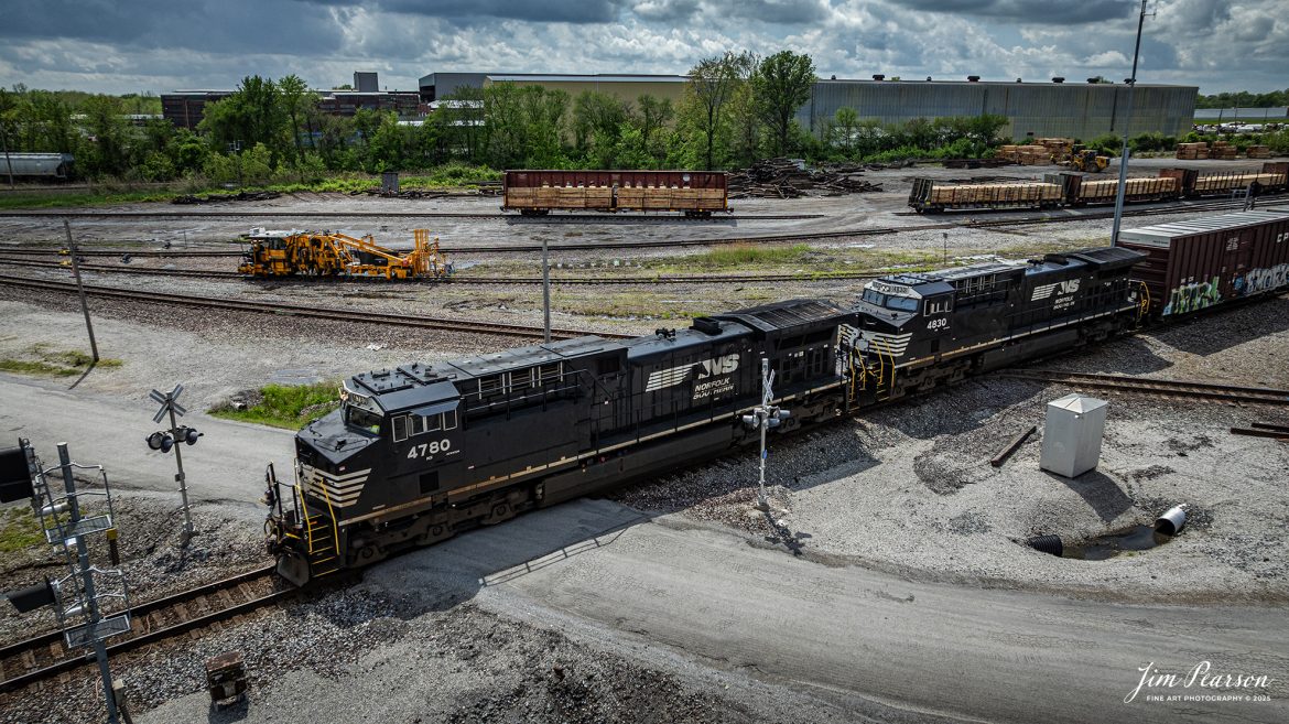 Norfolk Southern 4780 and 4830 lead a mixed freight across the diamond at Mt. Vernon, Illinois as it heads east on the NS Southern East District as they cross over the Union Pacific Mount Vernon Subdivision, on April 25th, 2025.

Tech Info: DJI Mavic 3 Classic Drone, RAW, 24mm, f/2.8, 1/2000, ISO 100.

#railroad #railroads #train, #trains #railway #railway #railtransport #railroadengines #picturesoftrains #picturesofrailways #besttrainphotograph #bestphoto #photographyoftrains #bestsoldpicture #JimPearsonPhotography #trainsfromadrone #norfolksouthern