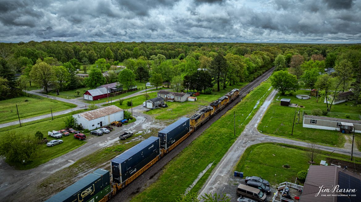 Union Pacific 7314 leads a hot intermodal (Z183?) as it heads south through Kell, Illinois on the Union Pacific Mount Vernon Subdivision, on April 25th, 2025, passing the grain complex.

Tech Info: DJI Mavic 3 Classic Drone, RAW, 24mm, f/2.8, 1/3200, ISO 160.

#railroad #railroads #train, #trains #railway #railway #railtransport #railroadengines #picturesoftrains #picturesofrailways #besttrainphotograph #bestphoto #photographyoftrains #bestsoldpicture #JimPearsonPhotography #trainsfromadrone #unionpacificrailway