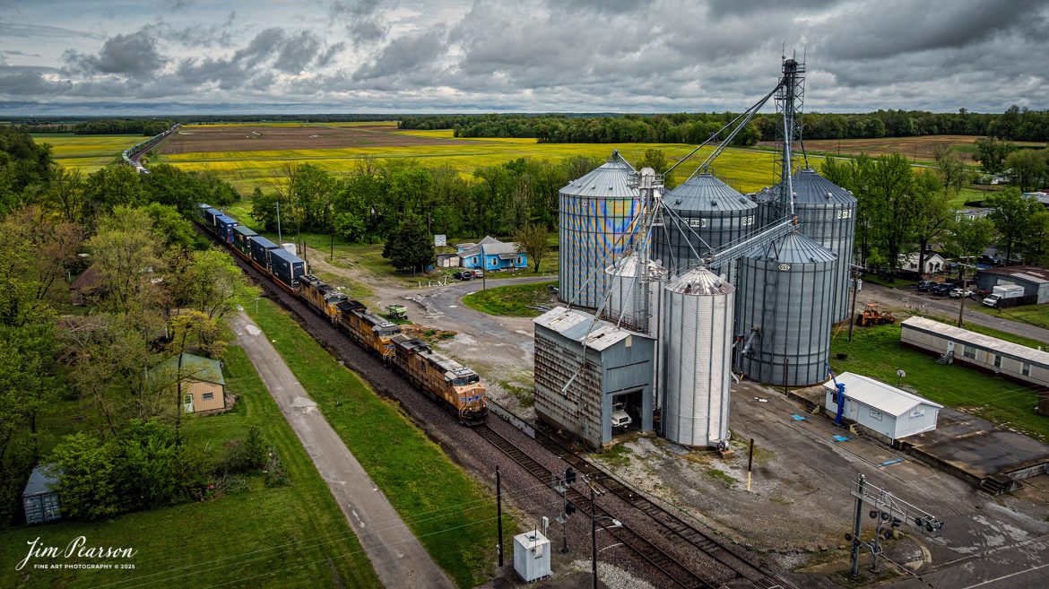 Union Pacific 7314 leads a hot intermodal (Z183?) as it passes through Kell, Illinois on the Union Pacific Mount Vernon Subdivision, on April 25th, 2025, passing the grain complex.

Tech Info: DJI Mavic 3 Classic Drone, RAW, 24mm, f/2.8, 1/2500, ISO 130.

#railroad #railroads #train, #trains #railway #railway #railtransport #railroadengines #picturesoftrains #picturesofrailways #besttrainphotograph #bestphoto #photographyoftrains #bestsoldpicture #JimPearsonPhotography #trainsfromadrone #unionpacificrailway