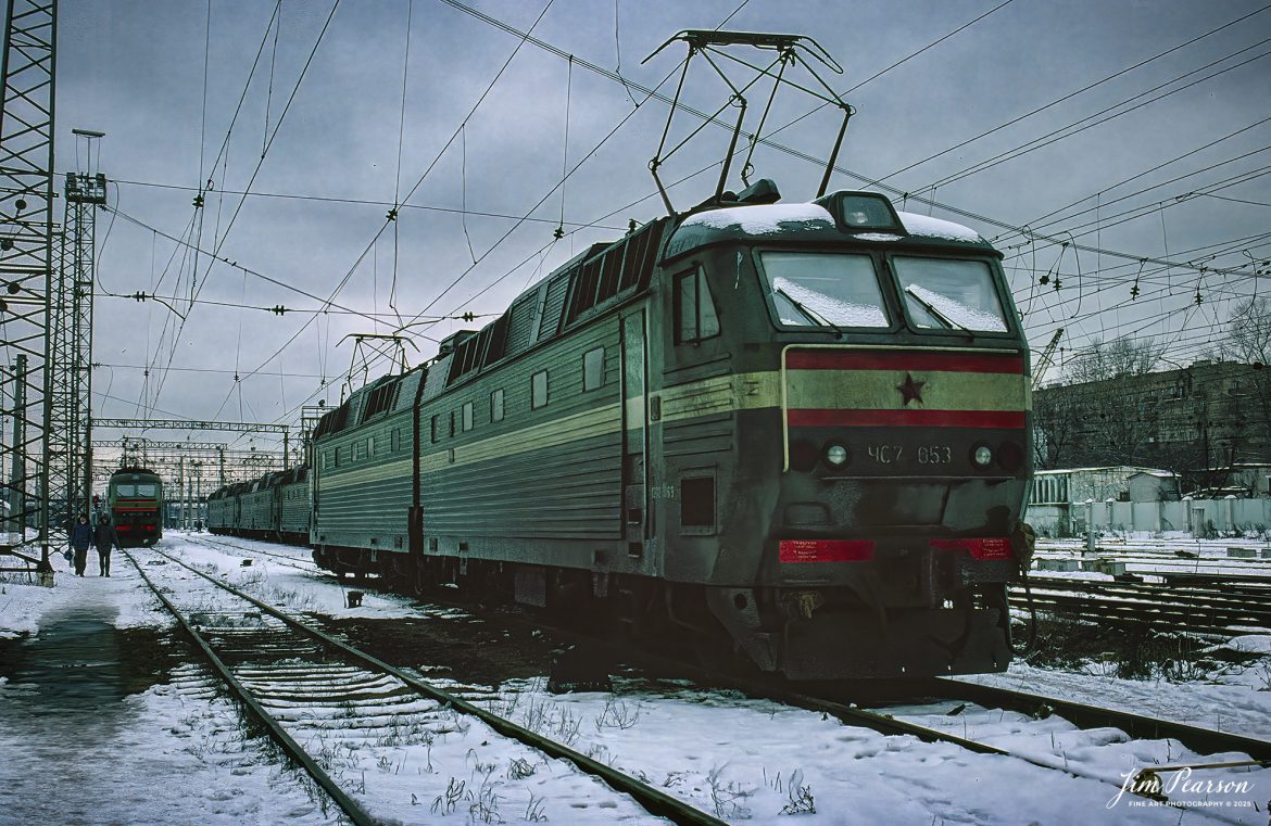 Film Wednesday – 1992 – USSR Locomotive 407053 sits in the yard at one of many stations at Moscow, Russia. This image is from a slide scan that I shot while I was taking part in a military humanitarian called Provide Hope.

For a while I was the non-commissioned officer in charge of the Air Force’s Electronic Imaging Center stationed at Aviano, Italy, where Combat Camera was tasked to document the Provide Hope operation. I was there for six months, and we flew missions in and out of the USSR. This was on one trip to Moscow where we spent a couple days in the country, documenting the delivery of supplies to an orphanage. Of course, during my off time, I made sure to visit the train station that was just outside our hotel!

According to Wikipedia: Operation Provide Hope was a humanitarian operation conducted by the U.S. Air Force to provide medical equipment to former Soviet republics during their transition to capitalism. The operation was announced by Secretary of State James A. Baker, III on January 22–23, 1992 and the initial shipment of supplies was sent on February 10, 1992. Twelve US Air Force C-5 and C-141 was carrying an estimated 500 tons of bulk-food rations and medicines into Moscow, St. Petersburg, Kyiv, Minsk, and Chisinau from Germany and Yerevan, Almaty, Dushanbe, Ashkhabad, Baku, Tashkent, and Bishkek from Turkey. In total, for nearly two weeks sixty-five missions flew 2,363 short tons (2,144 t) of food and medical supplies to 24 locations in the Commonwealth of Independent States during the initial phase of operation. Much of these supplies was left over from the buildup to the Persian Gulf War.

Small teams of US personnel from various government agencies (On-Site Inspection Agency, USAID, and USDA) had been placed in each destination shortly before the deliveries, to coordinate with local officials and to monitor to the best extent possible that the deliveries reached the intended recipients (i.e., orphanages, hospitals, soup kitchens, and needy families).

Tech Info: Camera, Nikon F3, Kodachrome Slide Film, no other data recorded, Scanned with a PlusTek 82001i Film Scanner.

#slidescan #filmphotography #trains #railroads #jimpearsonphotography #FilmPhotography