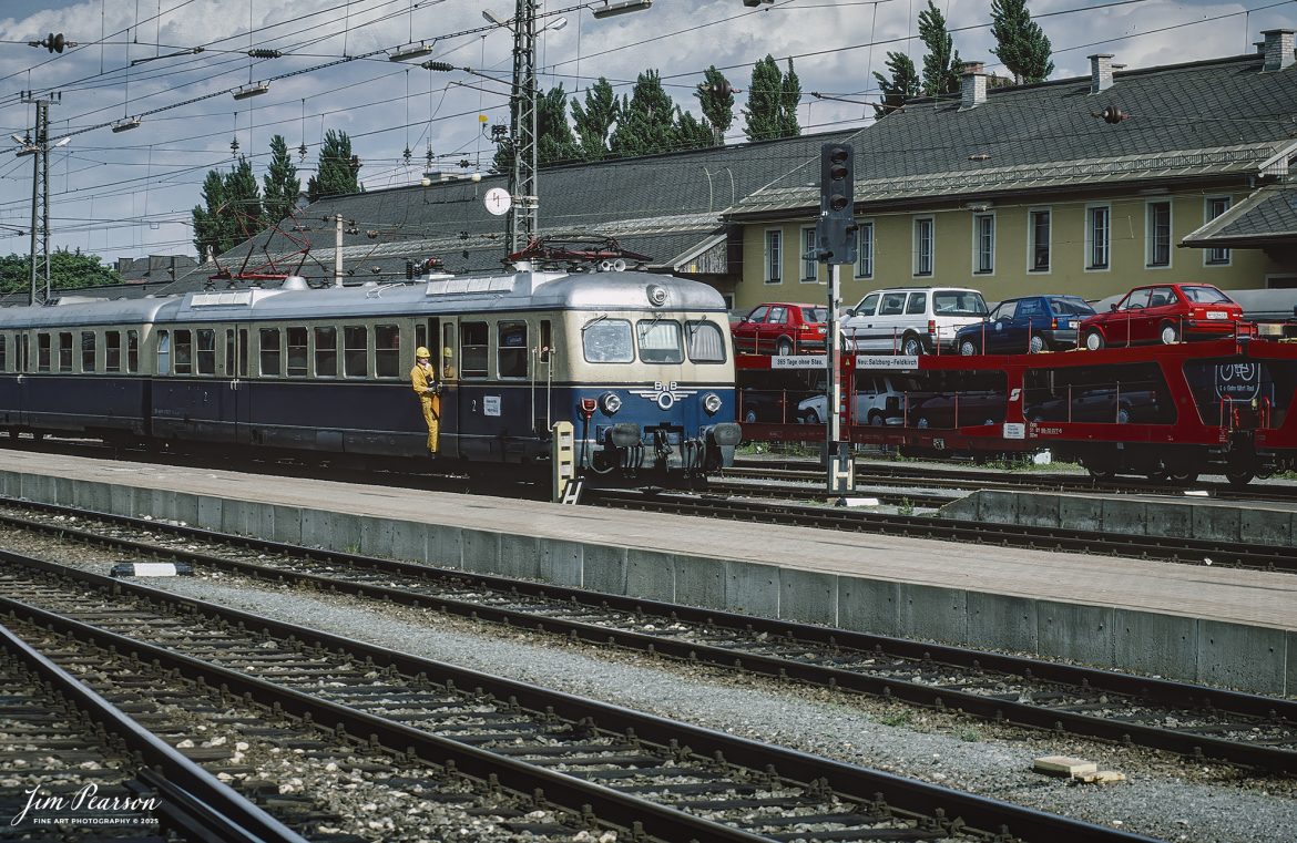 Film Wednesday – 1993 – Today’s slide scans are from a trip I took between Aviano, Italy and Zermatt, Switzerland. This was shot somewhere between St. Morenz and Zermatt, Switzerland as I was headed to there on a 3-day weekend.

Not sure what station this was at, but here we have crews working on building a passenger train as they pass an auto carrier in the background. If you know, please share it in the comments.

Tech Info: Camera, Nikon F3, Kodachrome Slide Film, no other data recorded, Scanned with a PlusTek 82001i Film Scanner.

#slidescan #filmphotography #trains #railroads #jimpearsonphotography #FilmPhotography