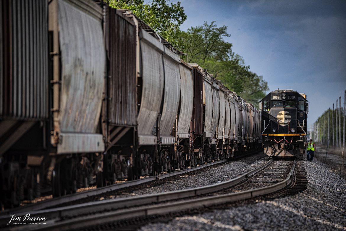 The conductor on Illinois Central 1019 (Death Star) does a roll-by inspection on a northbound Canadian National mixed freight at the south end of the yard lead in Effingham, Illinois on the CN Champagne Subdivision, on April 25th, 2025.

Tech Info: Nikon D810, RAW, Sigma 150-600 @ 440mm, f/6, 1/1600, ISO 640.

#railroad #railroads #train, #trains #railway #railway #railtransport #railroadengines #picturesoftrains #picturesofrailways #besttrainphotograph #bestphoto #photographyoftrains #bestsoldpicture #JimPearsonPhotography #trainsfromadrone #canadiannational