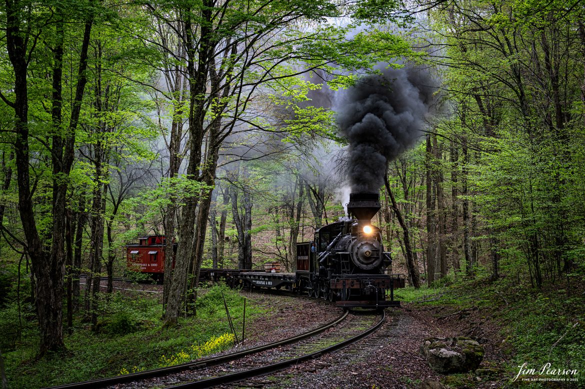 Cass Scenic Railroad Heisler #6 pulls through the curve approaching the water tank at Whittaker, WV during the Cass Spring Photographers Special, from Cass, West Virginia on May 3rd, 2025. 

According to the Mountain Rail West Virginia Website: The Meadow River Lumber No. 6 was built by the Heisler Locomotive Works in Erie, PA, in 1929 for the Bostonia Coal & Clay Products Company of New Bethlehem, PA.

The Heisler was sold to the Meadow River Lumber Company at Rainelle, WV in 1939, where it was rostered as No. 6. She retired from the lumber company in 1965 and was purchased by the purchased it by the state of West Virginia purchased. The engine ran under its own steam from Rainelle to its new home in Cass in December 1966. No. 6 would begin operating on the railroad in 1968. The Heisler is the fastest geared locomotive in the Cass collection.

Tech Info: Nikon Z6ii, RAW, Nikon 24-70 @ 55mm, f/4, 1/640, ISO 720.

#railroad #railroads #train, #trains #railway #railway #railtransport #railroadengines #picturesoftrains #picturesofrailways #besttrainphotograph #bestphoto #photographyoftrains #bestsoldpicture #JimPearsonPhotography #steamtrain #casssenicrailroad