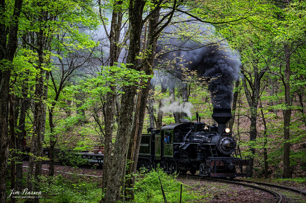 Cass Scenic Railroad Heisler #6 pulls through the curve approaching the water tank at Whittaker, WV during the Cass Spring Photographers Special, from Cass, West Virginia on May 3rd, 2025. 

According to the Mountain Rail West Virginia Website: The Meadow River Lumber No. 6 was built by the Heisler Locomotive Works in Erie, PA, in 1929 for the Bostonia Coal & Clay Products Company of New Bethlehem, PA.

The Heisler was sold to the Meadow River Lumber Company at Rainelle, WV in 1939, where it was rostered as No. 6. She retired from the lumber company in 1965 and was purchased by the purchased it by the state of West Virginia purchased. The engine ran under its own steam from Rainelle to its new home in Cass in December 1966. No. 6 would begin operating on the railroad in 1968. The Heisler is the fastest geared locomotive in the Cass collection.

Tech Info: Nikon Z6ii, RAW, Nikon 24-70 @ 70mm, f/4, 1/640, ISO 800.

#railroad #railroads #train, #trains #railway #railway #railtransport #railroadengines #picturesoftrains #picturesofrailways #besttrainphotograph #bestphoto #photographyoftrains #bestsoldpicture #JimPearsonPhotography #steamtrain #casssenicrailroad