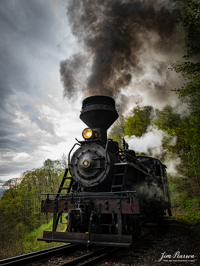 Cass Scenic Railway Heisler #6 pulls through the curve under stormy skies at the overlook at milepost 6 during the Cass Spring Photographers Special, out of Cass, West Virginia on May 3rd, 2025. This is the first of many of you have to look forward to from my trip to West Virginia. 

According to the Mountain Rail West Virginia Website: The Meadow River Lumber No. 6 was built by the Heisler Locomotive Works in Erie, PA, in 1929 for the Bostonia Coal & Clay Products Company of New Bethlehem, PA.

The Heisler was sold to the Meadow River Lumber Company at Rainelle, WV in 1939, where it was rostered as No. 6. She retired from the lumber company in 1965 and purchased by the State of West Virginia. The engine ran under its own steam from Rainelle to its new home in Cass in December 1966. No. 6 would begin operating on the railroad in 1968. The Heisler is the fastest geared locomotive in the Cass collection.

Tech Info: Nikon Z6ii, RAW, Nikon 24-70 @ 24mm, f/6.3, 1/640, ISO 2000.

#railroad #railroads #train, #trains #railway #railway #steamtrains #railtransport #railroadengines #picturesoftrains #picturesofrailways #besttrainphotograph #bestphoto #photographyoftrains #bestsoldpicture #JimPearsonPhotography #steamtrains #cassscenicrailway