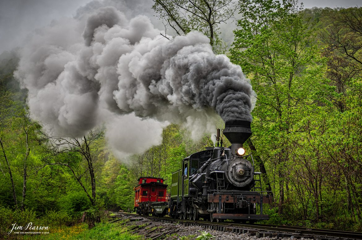 Engineer Noah Barkley keeps a watchful eye on the track ahead from Cass Scenic Railway Heisler #6 as they pull through the countryside at Wanless on the way to Durban, West Virginia, during the Cass Spring Photographers Special, from Cass, West Virginia on May 4th, 2025. 

According to the Mountain Rail West Virginia Website: The Meadow River Lumber No. 6 was built by the Heisler Locomotive Works in Erie, PA, in 1929 for the Bostonia Coal & Clay Products Company of New Bethlehem, PA.

The Heisler was sold to the Meadow River Lumber Company at Rainelle, WV in 1939, where it was rostered as No. 6. She retired from the lumber company in 1965 and was purchased by the purchased it by the state of West Virginia purchased. The engine ran under its own steam from Rainelle to its new home in Cass in December 1966. No. 6 would begin operating on the railroad in 1968. The Heisler is the fastest geared locomotive in the Cass collection.

Tech Info: Nikon Z6ii, RAW, Nikon 24-70 @ 25mm, f/5.3, 1/160, ISO 100.

#railroad #railroads #train, #trains #railway #railway #railtransport #railroadengines #picturesoftrains #picturesofrailways #besttrainphotograph #bestphoto #photographyoftrains #bestsoldpicture #JimPearsonPhotography #steamtrain #casssenicrailway
