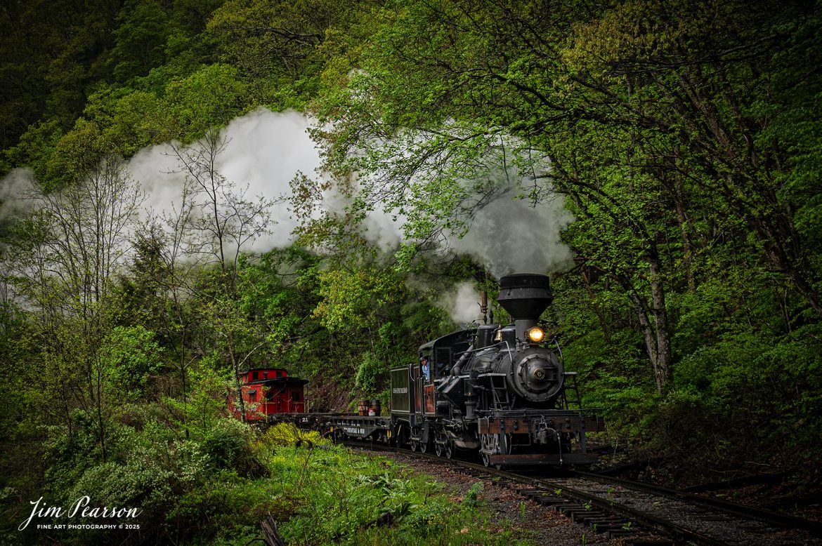 Engineer Noah Barkley keeps a watchful eye on the track ahead from Cass Scenic Railway Heisler #6 as they pull through the countryside at Wanless along the Greenbrier River, on the way to Durban, West Virginia, during the Cass Spring Photographers Special, from Cass, West Virginia on May 4th, 2025. 

According to the Mountain Rail West Virginia Website: The Meadow River Lumber No. 6 was built by the Heisler Locomotive Works in Erie, PA, in 1929 for the Bostonia Coal & Clay Products Company of New Bethlehem, PA.

The Heisler was sold to the Meadow River Lumber Company at Rainelle, WV in 1939, where it was rostered as No. 6. She retired from the lumber company in 1965 and was purchased by the purchased it by the state of West Virginia purchased. The engine ran under its own steam from Rainelle to its new home in Cass in December 1966. No. 6 would begin operating on the railroad in 1968. The Heisler is the fastest geared locomotive in the Cass collection.

Tech Info: Nikon Z6ii, RAW, Nikon 24-70 @ 26mm, f/7.1, 1/200, ISO 200.

#railroad #railroads #train, #trains #railway #railway #railtransport #railroadengines #picturesoftrains #picturesofrailways #besttrainphotograph #bestphoto #photographyoftrains #bestsoldpicture #JimPearsonPhotography #steamtrain #casssenicrailway