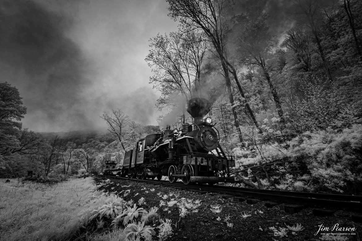 In this week’s Saturday Infrared photo, we catch Engineer Noah Barkley as he keeps a watchful eye on the track behind from Cass Scenic Railroad Heisler #6 as they back through the countryside at Wanless as they prepare for another photo runby during the Cass Spring Photographers Special, from Cass, West Virginia on May 4th, 2025. 

According to the Mountain Rail West Virginia Website: The Meadow River Lumber No. 6 was built by the Heisler Locomotive Works in Erie, PA, in 1929 for the Bostonia Coal & Clay Products Company of New Bethlehem, PA.

The Heisler was sold to the Meadow River Lumber Company at Rainelle, WV in 1939, where it was rostered as No. 6. She retired from the lumber company in 1965 and was purchased by the purchased it by the state of West Virginia purchased. The engine ran under its own steam from Rainelle to its new home in Cass in December 1966. No. 6 would begin operating on the railroad in 1968. The Heisler is the fastest geared locomotive in the Cass collection.

Tech Info: Fu, RAW, Nikon 10-24 @ 10mm, f/4.5, 1/180, ISO 400.

#railroad #railroads #train, #trains #railway #railway #railtransport #railroadengines #picturesoftrains #picturesofrailways #besttrainphotograph #bestphoto #photographyoftrains #bestsoldpicture #JimPearsonPhotography #steamtrain #casssenicrailway #irphotography