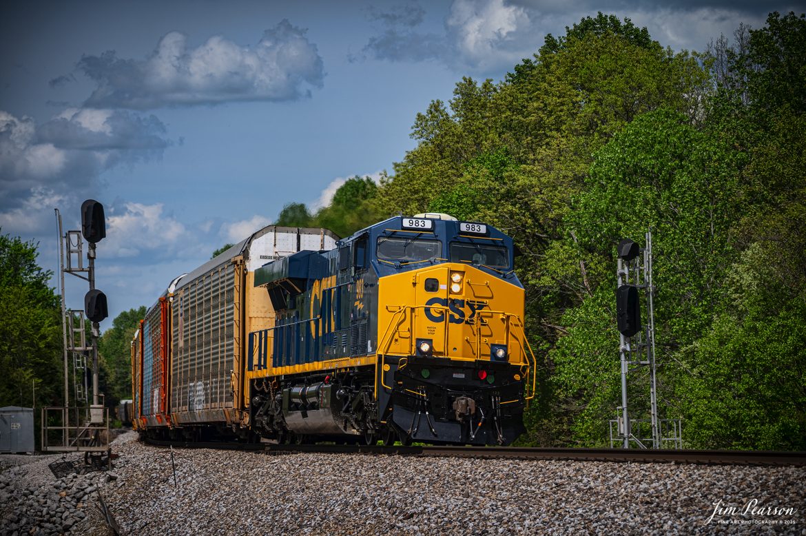 A newly painted and refurbished CSXT 983 leads autorack train M217 south as it passed the signals at the north end of the siding at Kelly, Kentucky on April 23rd, 2025, on the CSX Henderson Subdivision.

Tech Info: Nikon Z6ii, RAW, Nikon 70-300 @ 150mm, f/6.3, 1/1250, ISO 250.

#railroad #railroads #train, #trains #railway #railway #railtransport #railroadengines #picturesoftrains #picturesofrailways #besttrainphotograph #bestphoto #photographyoftrains #bestsoldpicture #JimPearsonPhotography