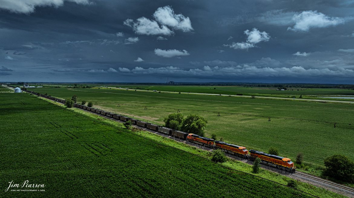 BNSF 3347 leads an empty coal train as it heads north on the BNSF Napier Subdivision at Percival, Iowa under treating skies, on June 24th, 2025.

Tech Info: DJI Mavic 3 Classic Drone, RAW, 24mm, f/5, 1/6400, ISO 100.

#railroad #railroads #train, #trains #railway #railway #steamtrains #railtransport #railroadengines #picturesoftrains #picturesofrailways #besttrainphotograph #bestphoto #photographyoftrains #bestsoldpicture #JimPearsonPhotography #trainsfromtheair #trainsfromadrone #bnsfrailway