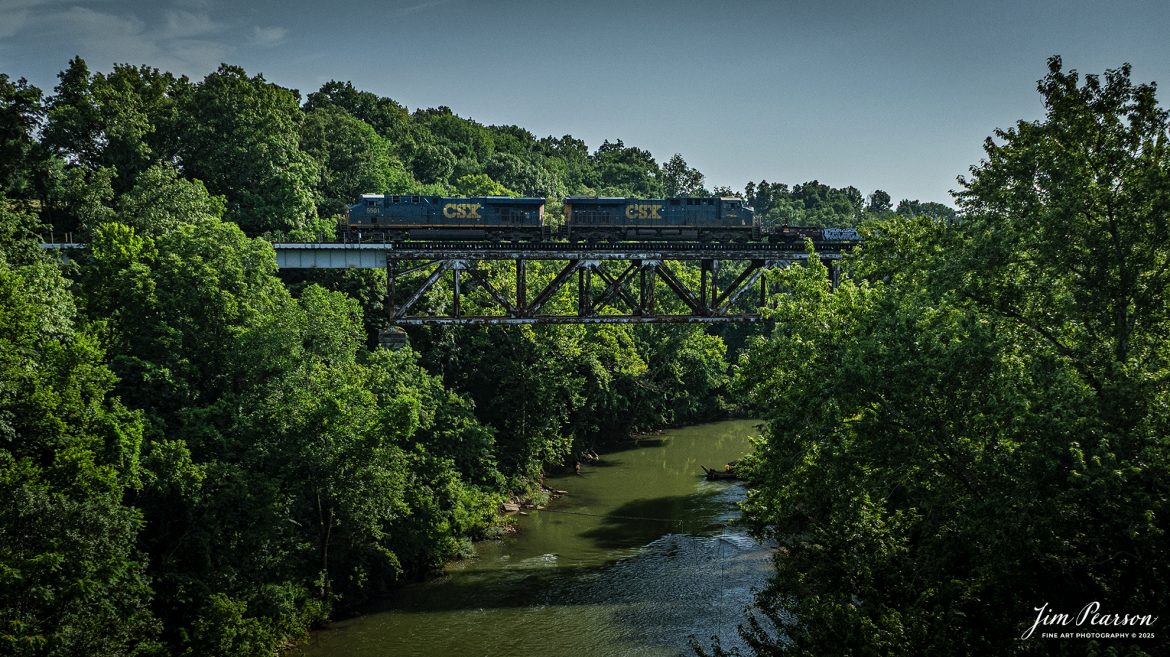 CSX Intermodal I128 crosses the Red River, just north of Adams, Tennessee, on July 7th, 2025, as it heads north with CSXT 5501 leading on the CSX Henderson Subdivision.

Tech Info: DJI Mavic 3 Classic Drone, RAW, 22mm, f/2.8, 1/4000, ISO 110.

#railroad #railroads #train, #trains #railway #railway #steamtrains #railtransport #railroadengines #picturesoftrains #picturesofrailways #besttrainphotograph #bestphoto #photographyoftrains #bestsoldpicture #JimPearsonPhotography #trainsfromtheair #trainsfromadrone