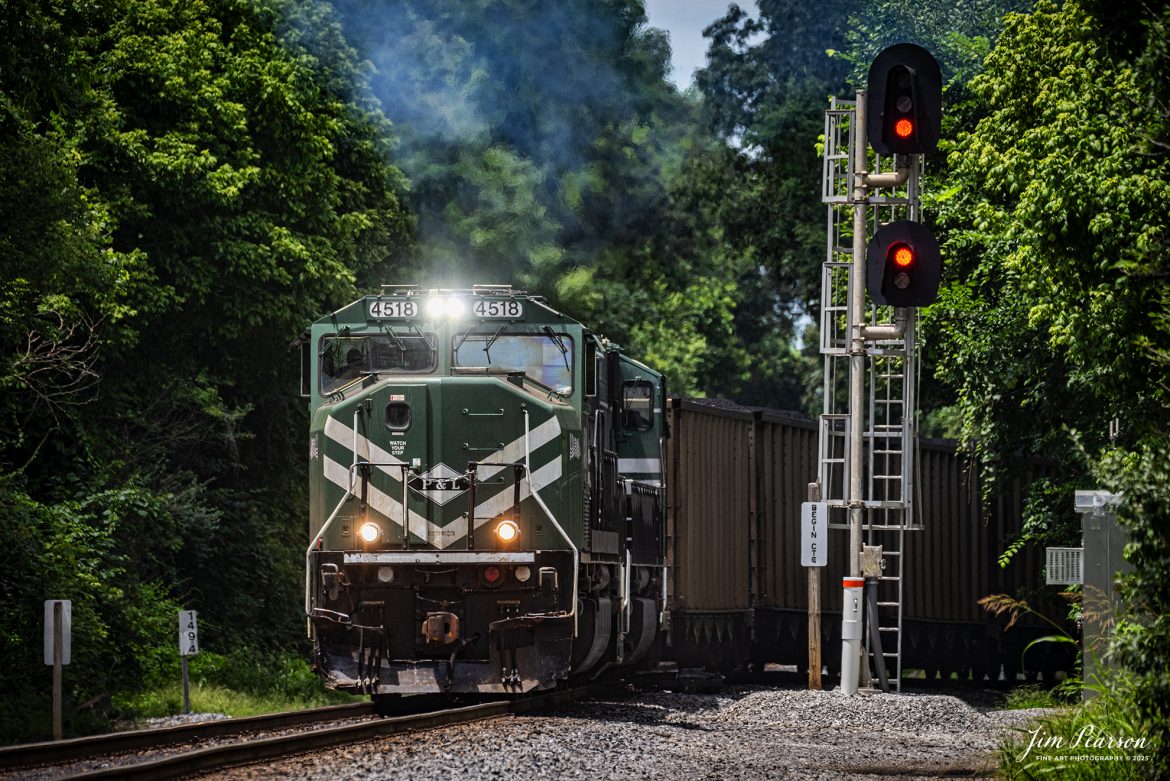 Paducah and Louisville’s 70MAC 4518 pulls their loaded Louisville Gas & Electric coal train off the Warrior Lead, just before West Yard in Madisonville, Ky, as they head north to Louisville on July 15th, 2025.
.
According to Wikipedia: The Paducah & Louisville Railway is a Class II railroad that operates freight service between Paducah and Louisville, Kentucky. The line is located entirely within the Commonwealth of Kentucky. The 270-mile line was purchased from Illinois Central Gulf Railroad in August 1986.

Tech Info: DJI Mavic 3 Classic Drone, RAW, 24mm, f/2.8, 1/1600, ISO 450.

#railroad #railroads #train, #trains #railway #railway #steamtrains #railtransport #railroadengines #picturesoftrains #picturesofrailways #besttrainphotograph #bestphoto #photographyoftrains #bestsoldpicture #JimPearsonPhotography #trainsfromtheair #trainsfromadrone #paducahandlouisvillerailway