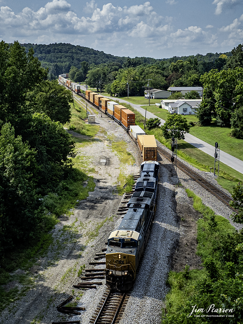 CSX I128 pulls onto the cutoff at Mortons Junction from the main as it heads north on the CSX Henderson Subdivision on July 30th, 2025. This track bypasses the downtown areas of Earlington and Madisonville, Ky and joins back onto the main at Arklow, just north of Madisonville. This stretch of track allows the dispatcher to run opposing trains around each other.

Tech Info: DJI Mavic 3 Classic Drone, RAW, 22mm, f/2.8, 1/2500, ISO 190.

#railroad #railroads #train, #trains #railway #railway #steamtrains #railtransport #railroadengines #picturesoftrains #picturesofrailways #besttrainphotograph #bestphoto #photographyoftrains #bestsoldpicture #JimPearsonPhotography #trainsfromtheair #trainsfromadrone #onecsx #csx