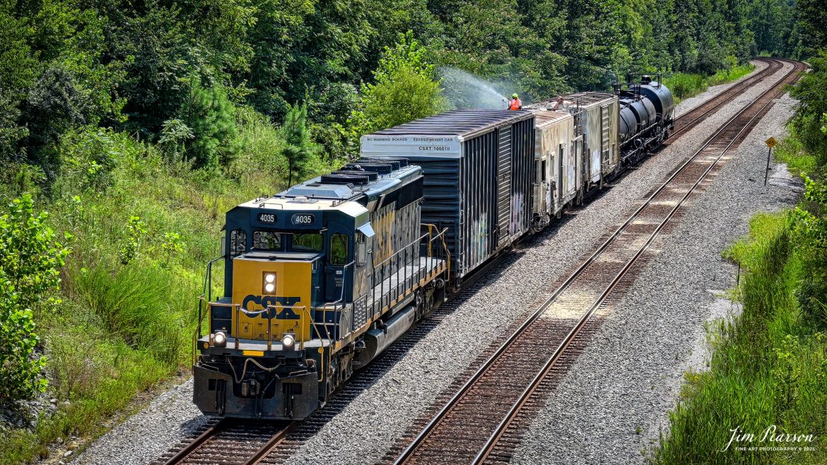 CSXT 4035 leads weed spraying train W054 as they work their way north at 15mph at Nortonville, Kentucky on July 30th, 2025, on the CSX Henderson Subdivision. 

According to Wikipedia: A weed sprayer train controls the growth of weeds and other vegetation along railroad right-of-ways that can cause significant issues with drainage, obstruct worker access and become a nuisance to adjacent property owners. 

Tech Info: This is a 4K video frame grab shot by my DJI Mavic 3 Classic Drone, RAW, 22mm, f/2.8, 1/2000, ISO 100.

#railroad #railroads #train, #trains #railway #railway #steamtrains #railtransport #railroadengines #picturesoftrains #picturesofrailways #besttrainphotograph #bestphoto #photographyoftrains #bestsoldpicture #JimPearsonPhotography #trainsfromtheair #trainsfromadrone #onecsx #csx