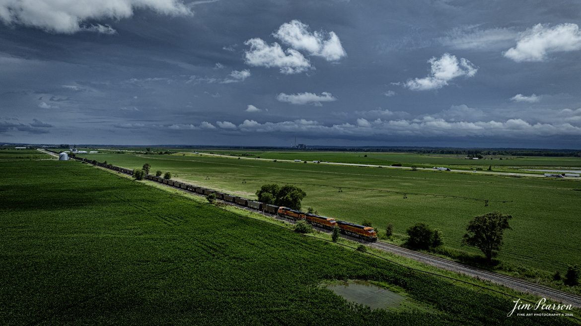 BNSF 3347 leads an empty coal train as it heads north on the BNSF Napier Subdivision at Percival, Iowa under treating skies, on June 24th, 2025.

Tech Info: DJI Mavic 3 Classic Drone, RAW, 24mm, f/5, 1/6400, ISO 100.

#railroad #railroads #train, #trains #railway #railway #steamtrains #railtransport #railroadengines #picturesoftrains #picturesofrailways #besttrainphotograph #bestphoto #photographyoftrains #bestsoldpicture #JimPearsonPhotography #trainsfromtheair #trainsfromadrone #bnsfrailway