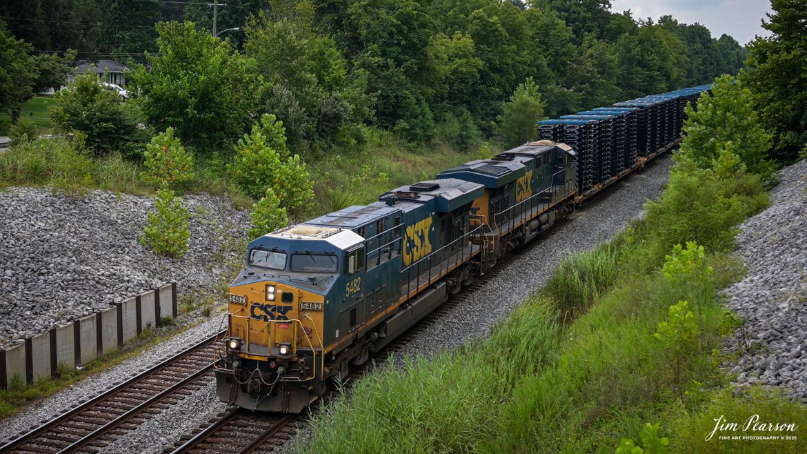CSXT 5482 leads CSX M512 with a string of truck frames as it heads north at Nortonville, Kentucky, on July 30th, 2025, on the CSX Henderson Subdivision. 

Tech Info: 4K Frame Grab from a DJI Mavic 3 Classic Drone, RAW, 22mm, f/2.8.

#railroad #railroads #train, #trains #railway #railway #steamtrains #railtransport #railroadengines #picturesoftrains #picturesofrailways #besttrainphotograph #bestphoto #photographyoftrains #bestsoldpicture #JimPearsonPhotography #trainsfromtheair #trainsfromadrone #onecsx #csx