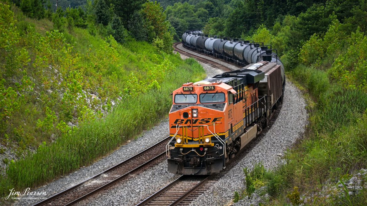 BNSF 6875 heads up loaded ethanol train CSX B621 through the S curve at Nortonville, Kentucky, on July 30th, 2025, on the CSX Henderson Subdivision. 

Tech Info: 4K Video Frame Grab from a DJI Mavic 3 Classic Drone, RAW, 22mm, f/2.8.

#railroad #railroads #train, #trains #railway #railway #steamtrains #railtransport #railroadengines #picturesoftrains #picturesofrailways #besttrainphotograph #bestphoto #photographyoftrains #bestsoldpicture #JimPearsonPhotography #trainsfromtheair #trainsfromadrone #onecsx #csx