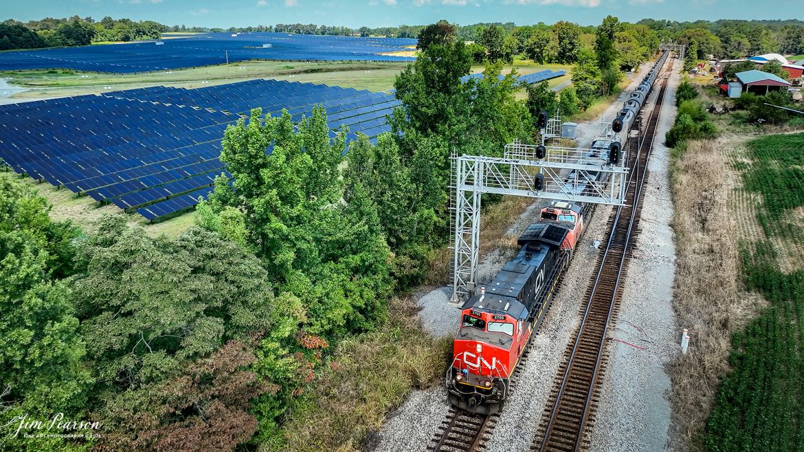 Canadian National 2705 leads CSX B211, a loaded ethanol train past the signals at Anaconda at Kelly, Kentucky as they make their way south on the CSX Henderson Subdivision on August 15th, 2025. To the left you can see some of new solar energy fields that have been built between Robards and Sebree, Ky.

Tech Info: 4K Frame Grab from a DJI Mavic 3 Classic Drone, RAW, 22mm, f/2.8.

#railroad #railroads #train, #trains #railway #railway #steamtrains #railtransport #railroadengines #picturesoftrains #picturesofrailways #besttrainphotograph #bestphoto #photographyoftrains #bestsoldpicture #JimPearsonPhotography #trainsfromtheair #trainsfromadrone #onecsx #csx #cnrailway