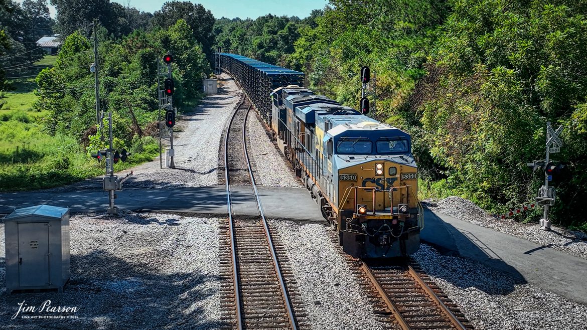 CSXT 5350 passes through the south end of the crossing at Slaughters, Ky with a string of truck frames for a plant somewhere up in Indiana as they head north on the CSX Henderson Subdivision on August 15th, 2025.

Tech Info: 4K Frame Grab from a DJI Mavic 3 Classic Drone, RAW, 22mm, f/2.8.

#railroad #railroads #train, #trains #railway #railway #steamtrains #railtransport #railroadengines #picturesoftrains #picturesofrailways #besttrainphotograph #bestphoto #photographyoftrains #bestsoldpicture #JimPearsonPhotography #trainsfromtheair #trainsfromadrone #onecsx #csx
