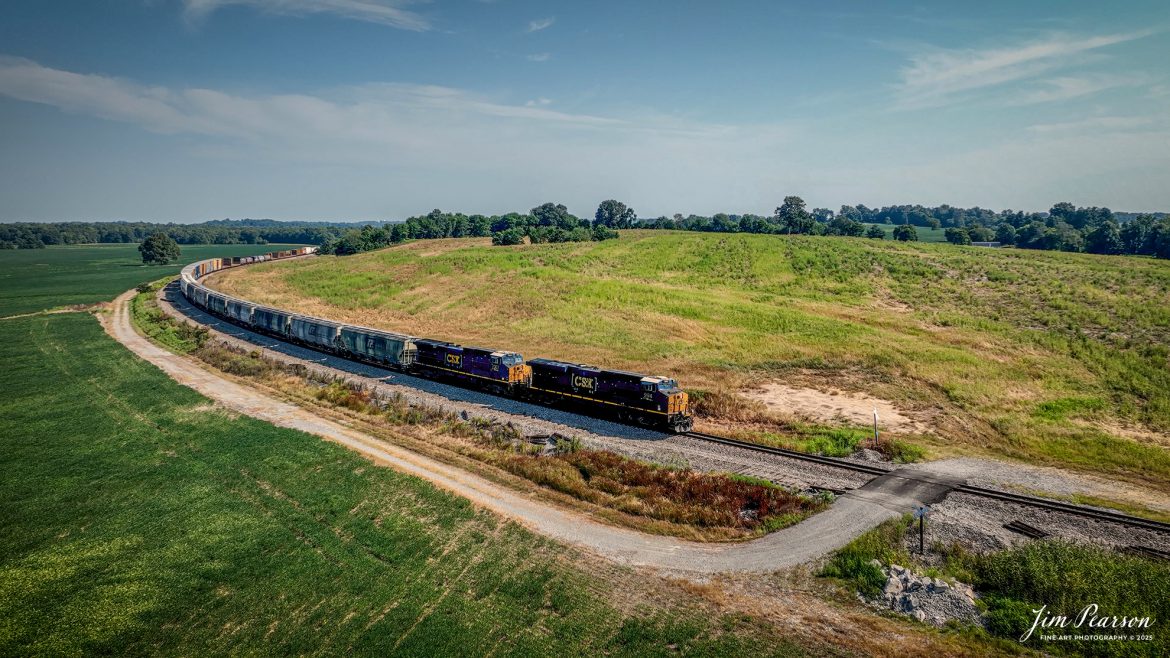 CSXT 994 leads CSX M513 as it rounds the curve at Breton, Kentucky, as they make their way south on August 15th, 2025, on the CSX Henderson Subdivision. 

Tech Info: 4K Frame Grab from a DJI Mavic 3 Classic Drone, RAW, 22mm, f/2.8.

#railroad #railroads #train, #trains #railway #railway #steamtrains #railtransport #railroadengines #picturesoftrains #picturesofrailways #besttrainphotograph #bestphoto #photographyoftrains #bestsoldpicture #JimPearsonPhotography #trainsfromtheair #trainsfromadrone #onecsx #csx