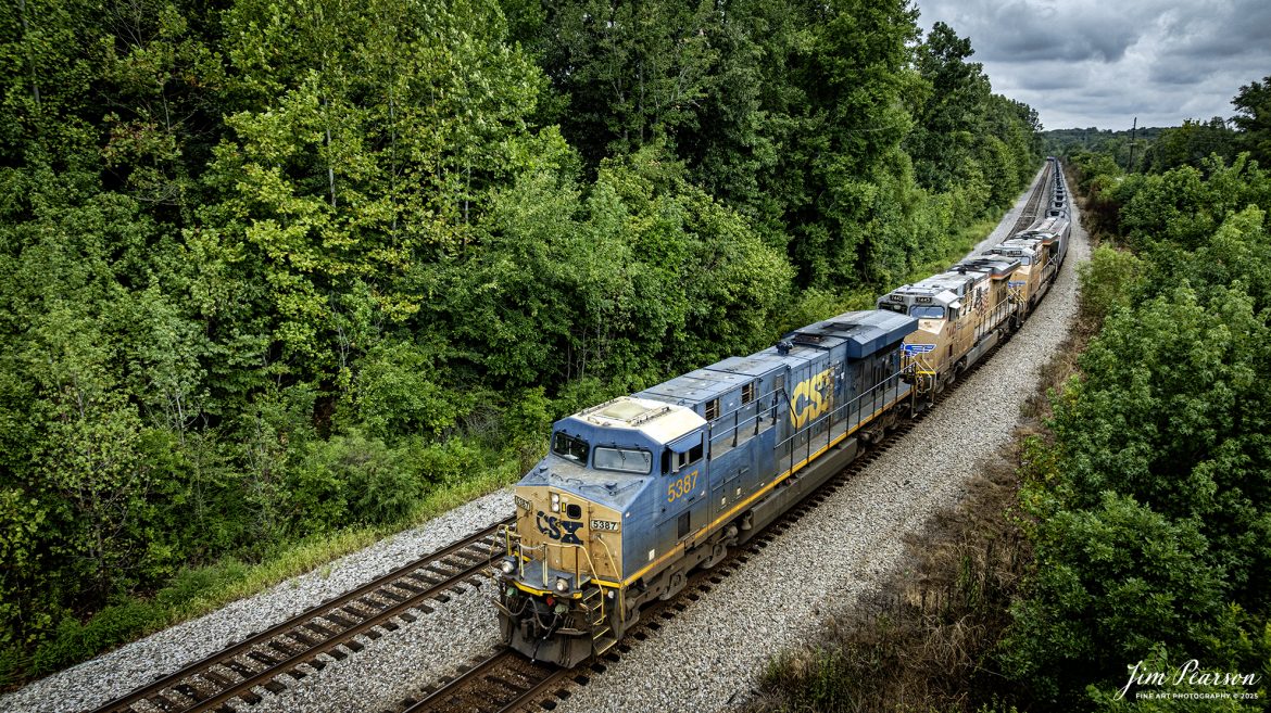 CSXT 5387 and two Union Pacific units lead loaded ethanol train B621 as they approach Romney, just south of Nortonville, Ky, as they head south on August 21st, 2025, on the CSX Henderson Subdivision.

Tech Info: DJI Mavic 3 Classic Drone, RAW, 22mm, f/2.8, 1/1000, ISO 170

#railroad #railroads #train, #trains #railway #railway #steamtrains #railtransport #railroadengines #picturesoftrains #picturesofrailways #besttrainphotograph #bestphoto #photographyoftrains #bestsoldpicture #JimPearsonPhotography #trainsfromtheair #trainsfromadrone #onecsx #csx