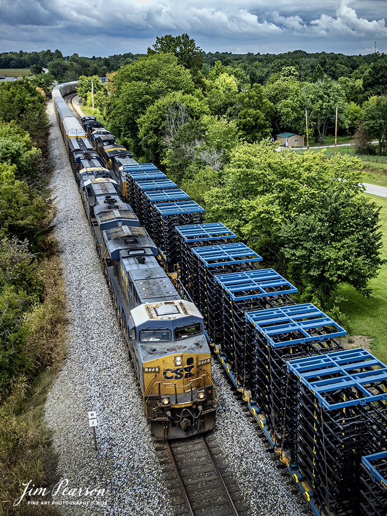 CSX I025. hot intermodal, meets CSX M512 at Kelly, Kentucky as 25 heads south on August 21st, 2025, on the CSX Henderson Subdivision. The loads behind the power on M512 are truck frames bound for a plant somewhere up in Indiana.

Tech Info: DJI Mavic 3 Classic Drone, RAW, 22mm, f/2.8, 1/1250, ISO 110

#railroad #railroads #train, #trains #railway #railway #steamtrains #railtransport #railroadengines #picturesoftrains #picturesofrailways #besttrainphotograph #bestphoto #photographyoftrains #bestsoldpicture #JimPearsonPhotography #trainsfromtheair #trainsfromadrone #onecsx #csx