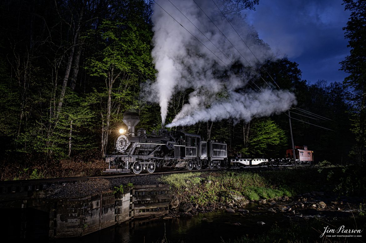 Cass Scenic Railroad Heisler#6 pulls across the bridge in a light rain at Leatherbark Creek during a night photo shoot as part of the Cass Spring Photographers Special, at Cass, West Virginia on May 3rd, 2025. 

According to the Mountain Rail West Virginia Website: The Meadow River Lumber No. 6 was built by the Heisler Locomotive Works in Erie, PA, in 1929 for the Bostonia Coal & Clay Products Company of New Bethlehem, PA.

The Heisler was sold to the Meadow River Lumber Company at Rainelle, WV in 1939, where it was rostered as No. 6. She retired from the lumber company in 1965 and was purchased by the purchased it by the state of West Virginia purchased. The engine ran under its own steam from Rainelle to its new home in Cass in December 1966. No. 6 would begin operating on the railroad in 1968. The Heisler is the fastest geared locomotive in the Cass collection.

Tech Info: Nikon Z6ii, RAW, Nikon 24-70 @ 24mm, f/3.2, 1/125, ISO 10,000.

#railroad #railroads #train, #trains #railway #railway #railtransport #railroadengines #picturesoftrains #picturesofrailways #besttrainphotograph #bestphoto #photographyoftrains #bestsoldpicture #JimPearsonPhotography #steamtrain #casssenicrailroad