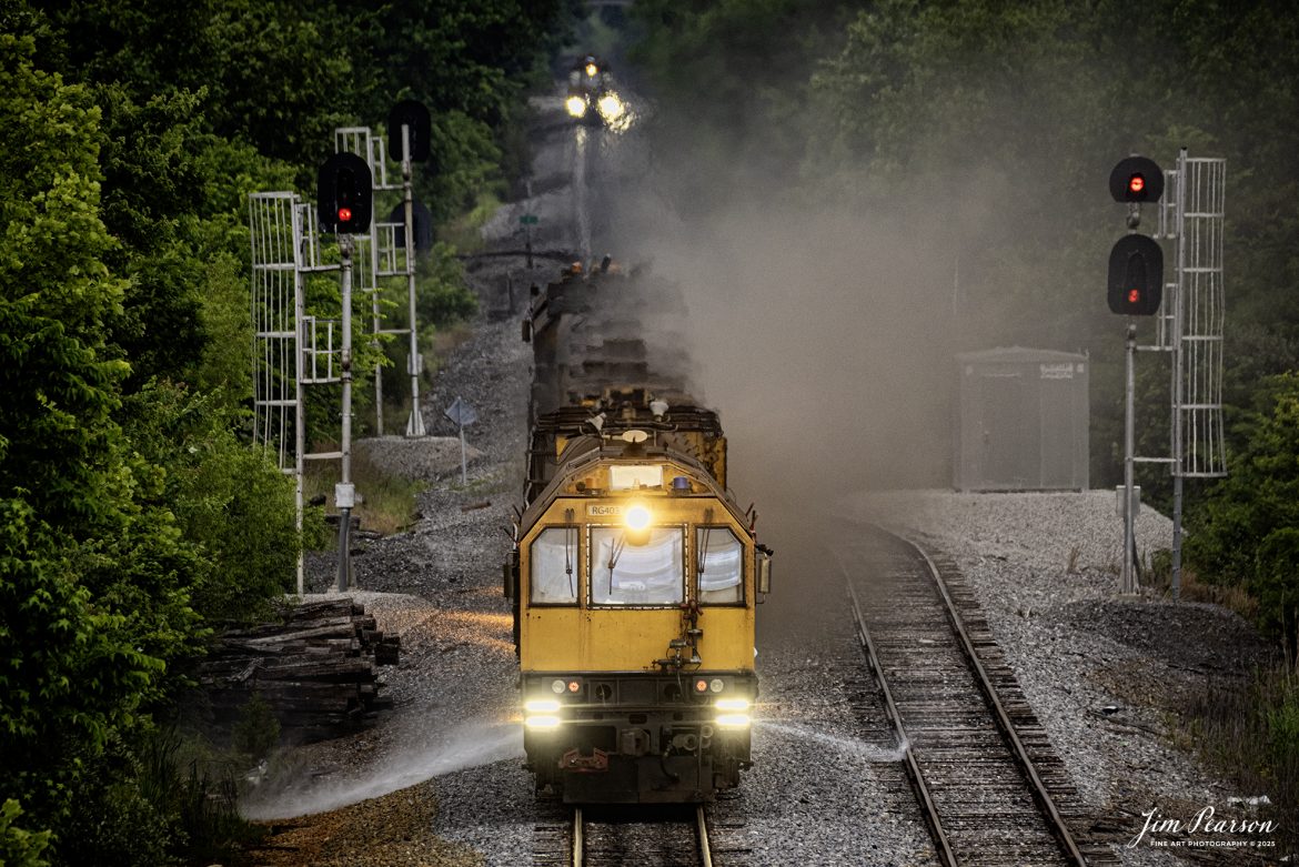 LORAM Railgrinder 403 (long grinder) heads south through the switch at the north end of the siding in Dawson Springs, Kentucky, as it works their on the Paducah and Louisville Railway, on June 5th, 2025.

The lights in the background are from the RG56, which is the short grinder that grinds switches and crossings.

According to Wikipedia: A rail grinder (or rail grinder) is a maintenance of way vehicle or train used to restore the profile and remove irregularities from worn tracks to extend its life and to improve the ride of trains using the track.

Tech Info: Nikon D810, RAW, Sigma 150-600 @ 450mm, f/6, 1/1600, ISO 400.

#railroad #railroads #train, #trains #railway #railway #steamtrains #railtransport #railroadengines #picturesoftrains #picturesofrailways #besttrainphotograph #bestphoto #photographyoftrains #bestsoldpicture #JimPearsonPhotography #Brightline #passengertrains #trainsfromtheair #trainsfromadrone #loram
