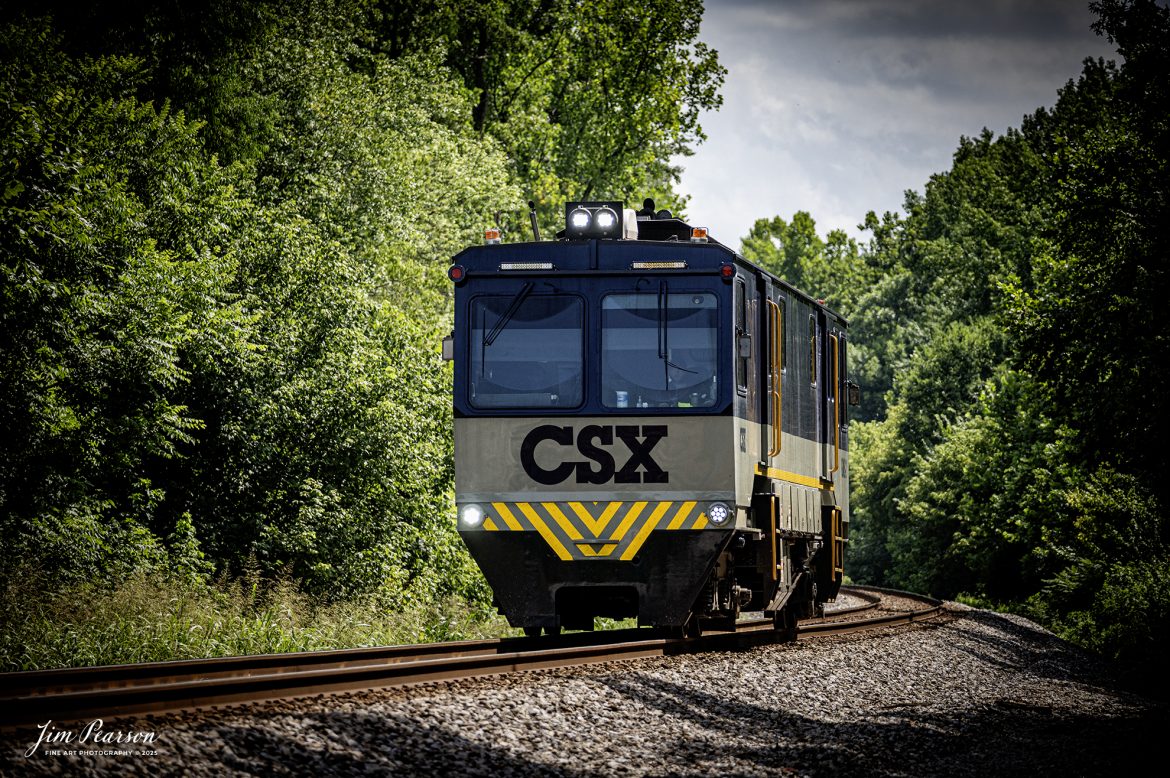 CSXT GMS-2, running as W002-22 heads north as they approach the location known as Romney, just south of Nortonville, Kentucky, on the CSX Henderson Subdivision, on July 22nd, 2025. 

From what I found on the Web: G-Gauge M-Measurement S-System is one of 2 such vehicles on CSX. It puts artificial stress in different directions on the rail to simulate a passing train and measures the amount of deflection caused by said stress to determine if tie, spikes and anchor systems are functioning as needed.

Tech Info: Nikon Z6ii, RAW, 70-300mm, @210, f/5.6, 1/1250, ISO 560.

#railroad #railroads #train, #trains #railway #railway #steamtrains #railtransport #railroadengines #picturesoftrains #picturesofrailways #besttrainphotograph #bestphoto #photographyoftrains #bestsoldpicture #JimPearsonPhotography #trainsfromtheair #trainsfromadrone